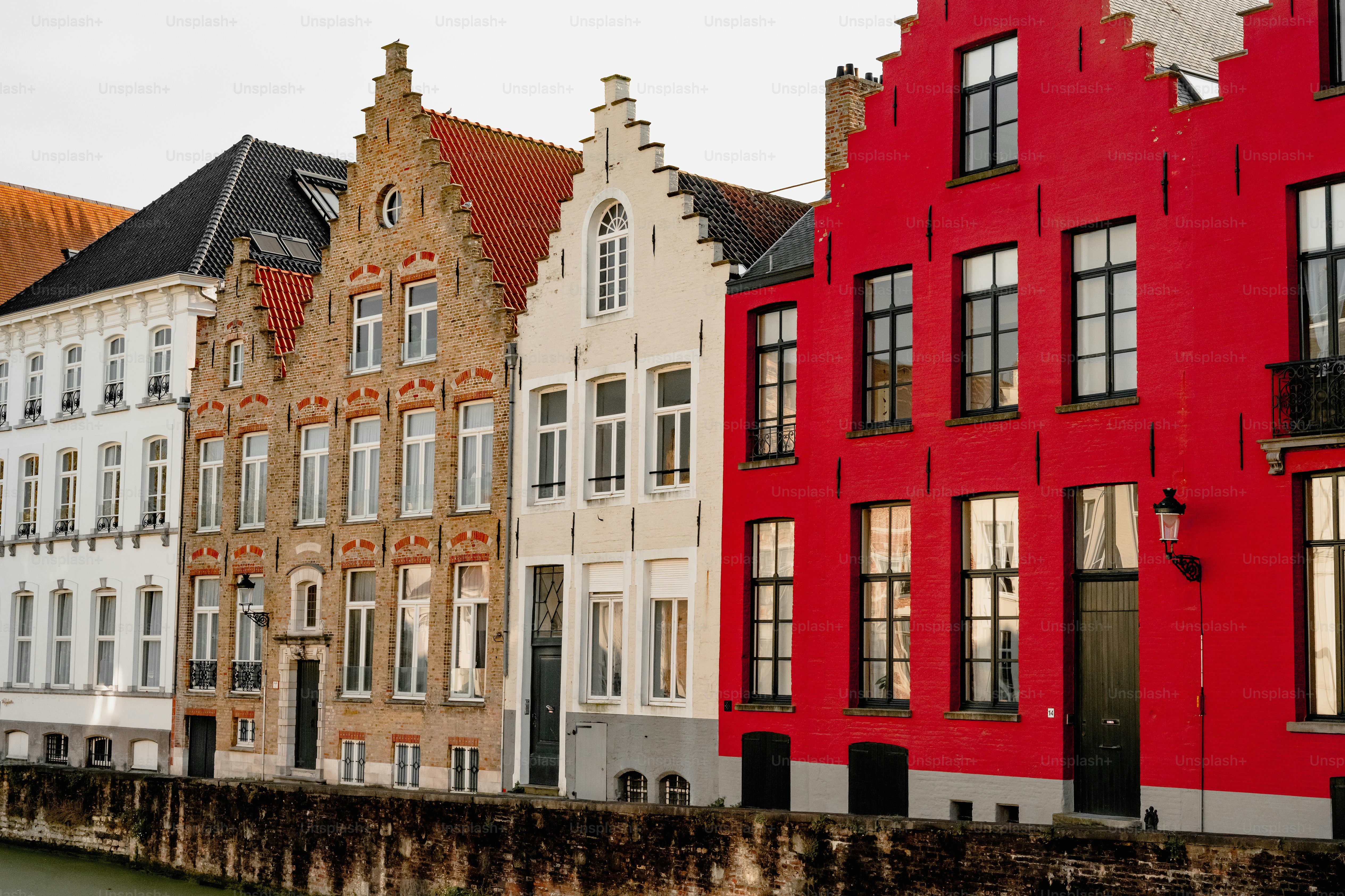 Colorful historic buildings line a canal