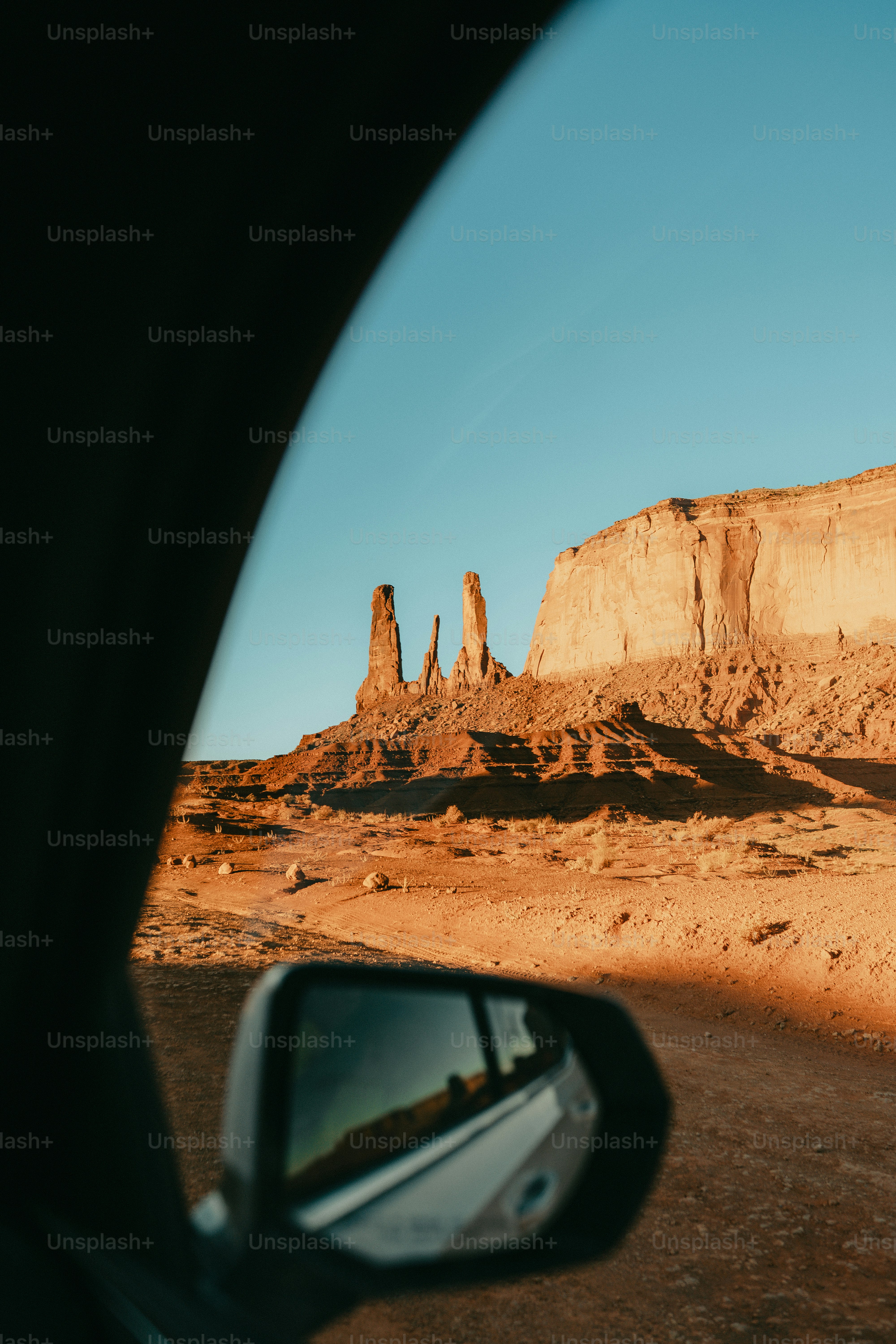 Desert rock formations seen from car window