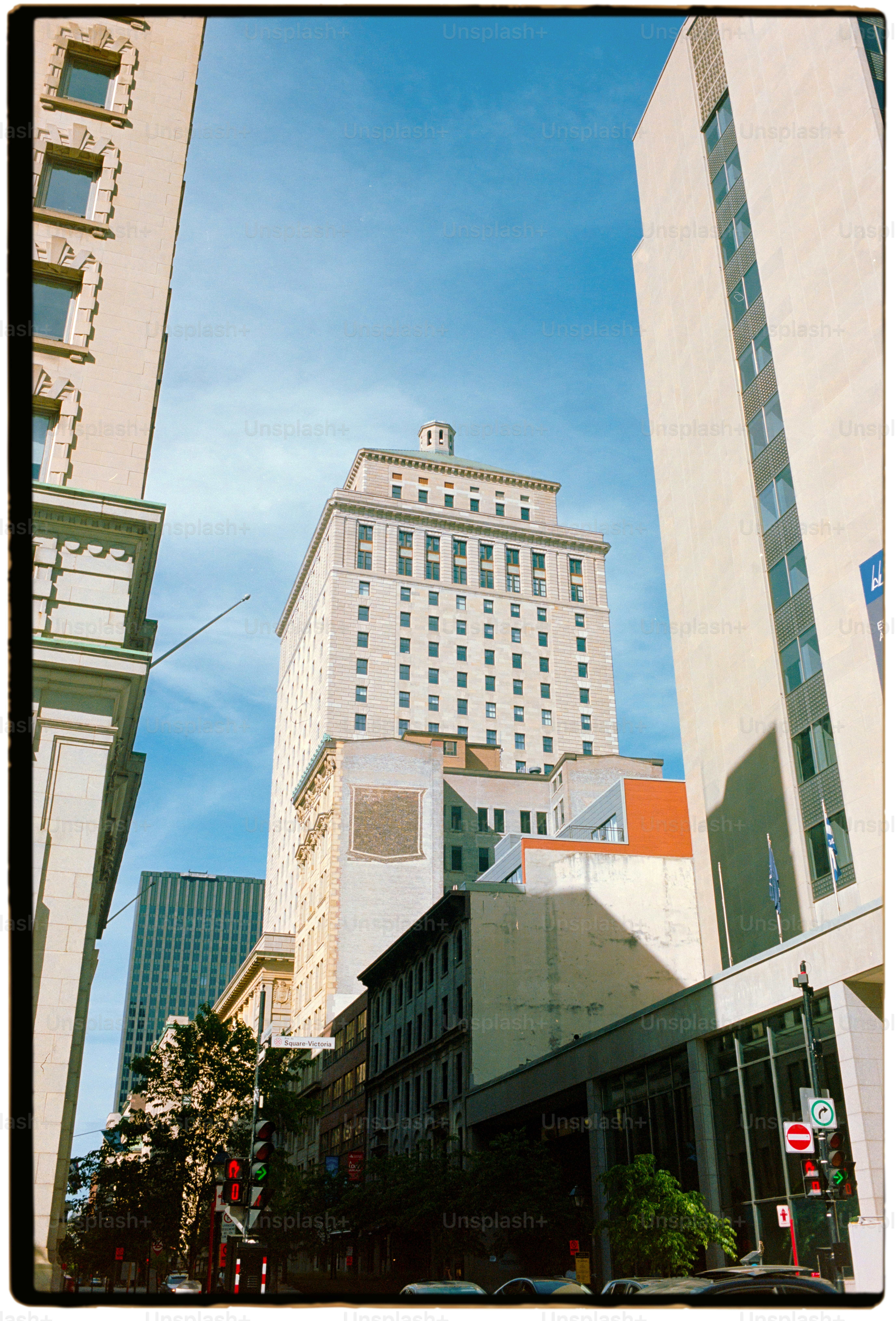 Tall buildings under a clear blue sky
