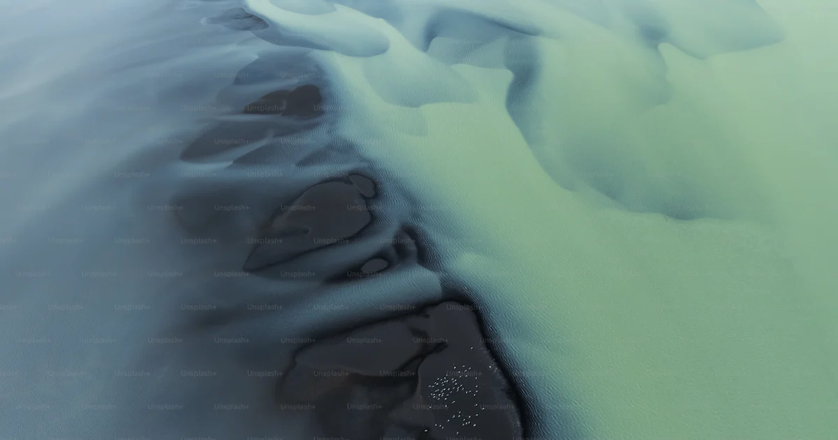 Two Rivers Merging Gif Two distinct colored rivers merging together photo – Wallpaper Image on ...