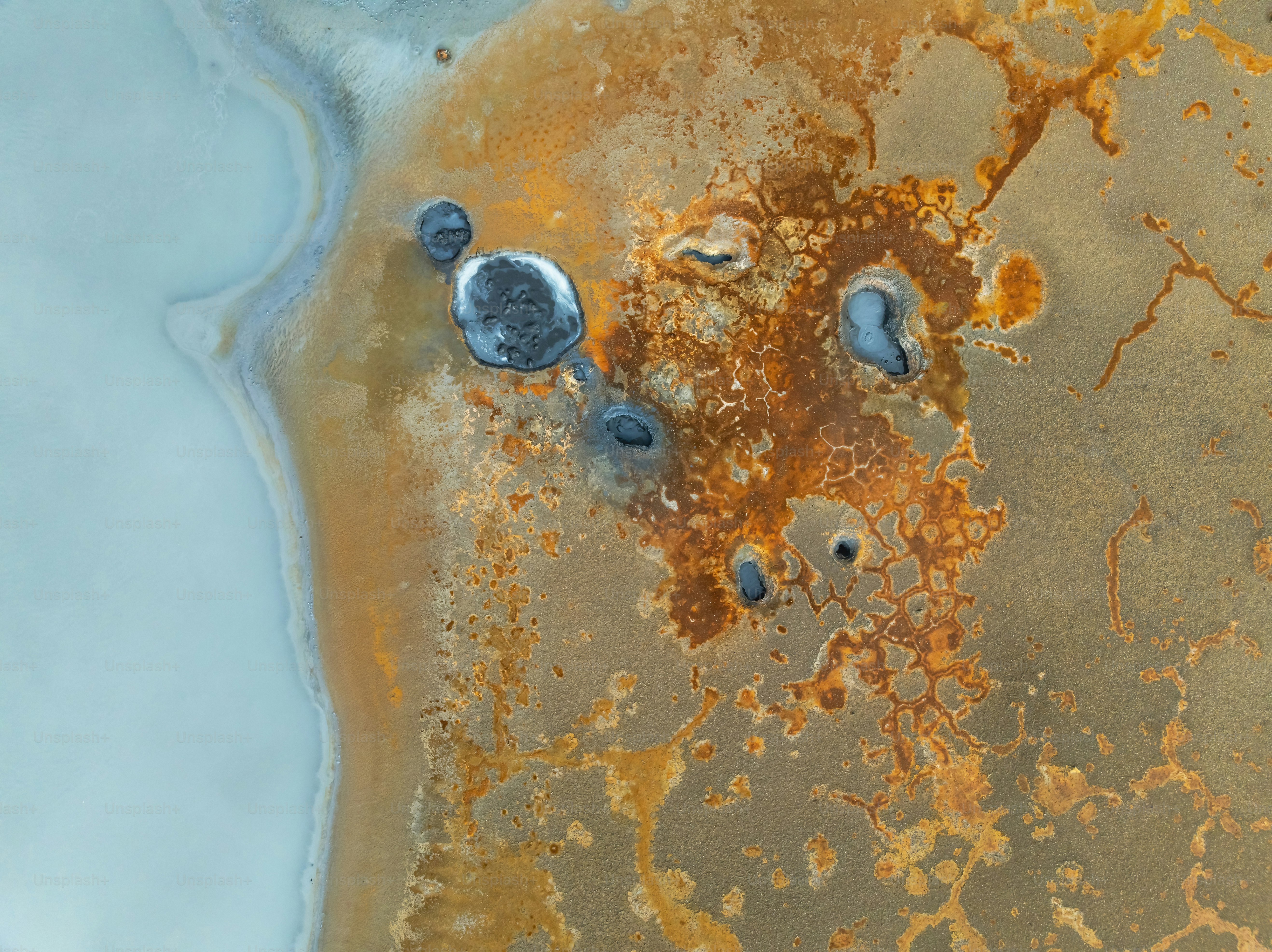 Abstract texture of rust and water with blue accents