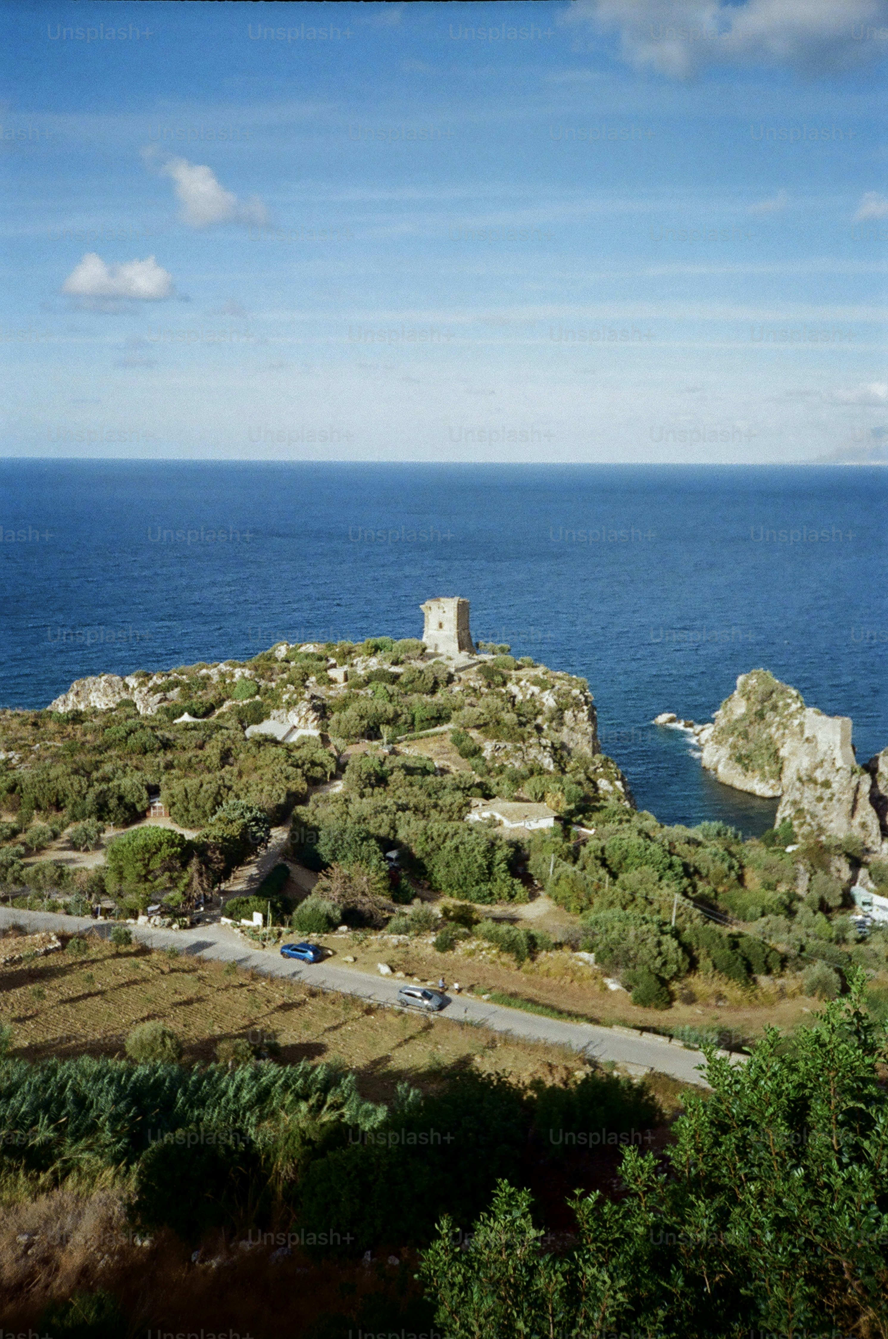 Coastal tower on a rocky island overlooking the sea