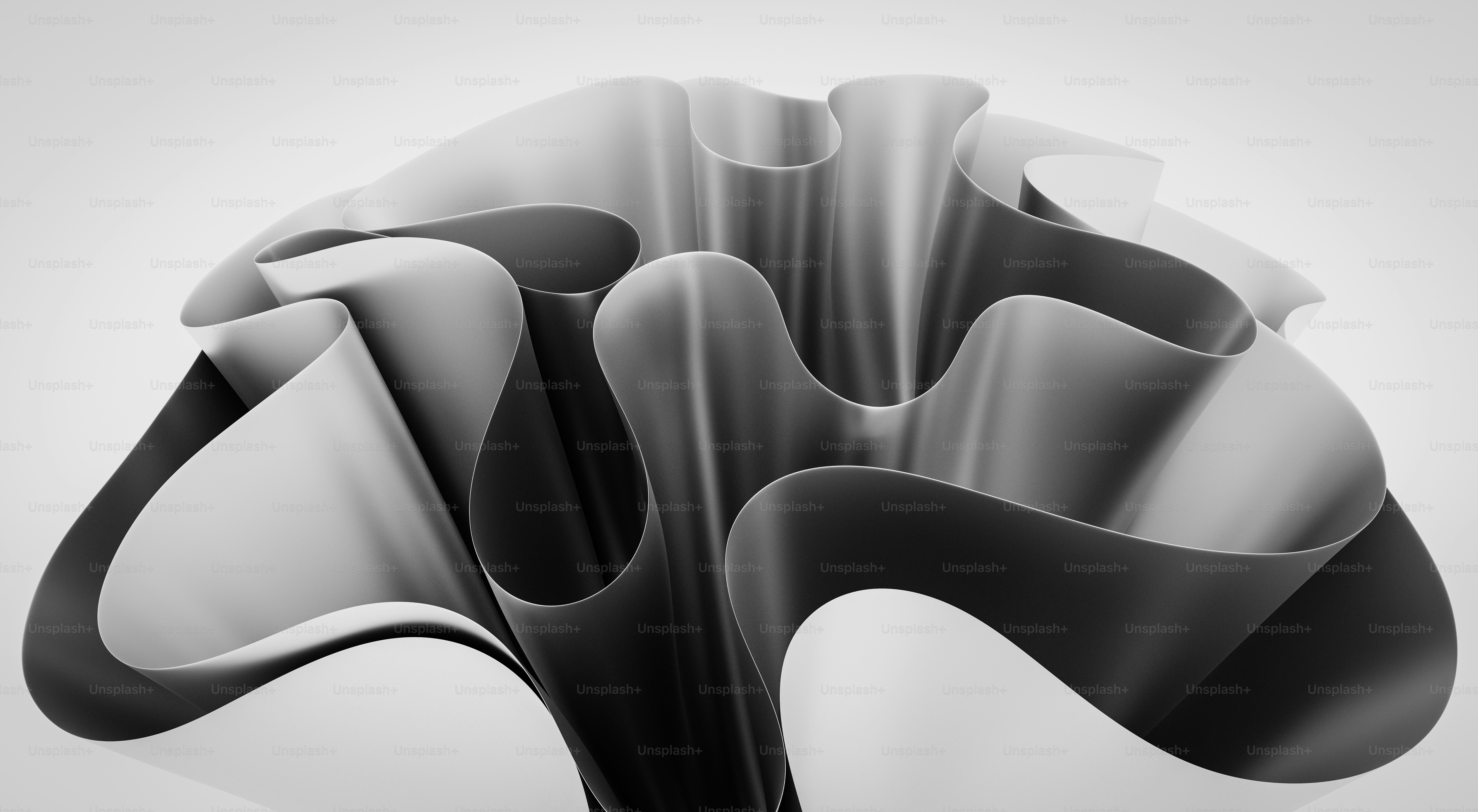 Abstract metallic sculpture with flowing curves and shadows. photo ...