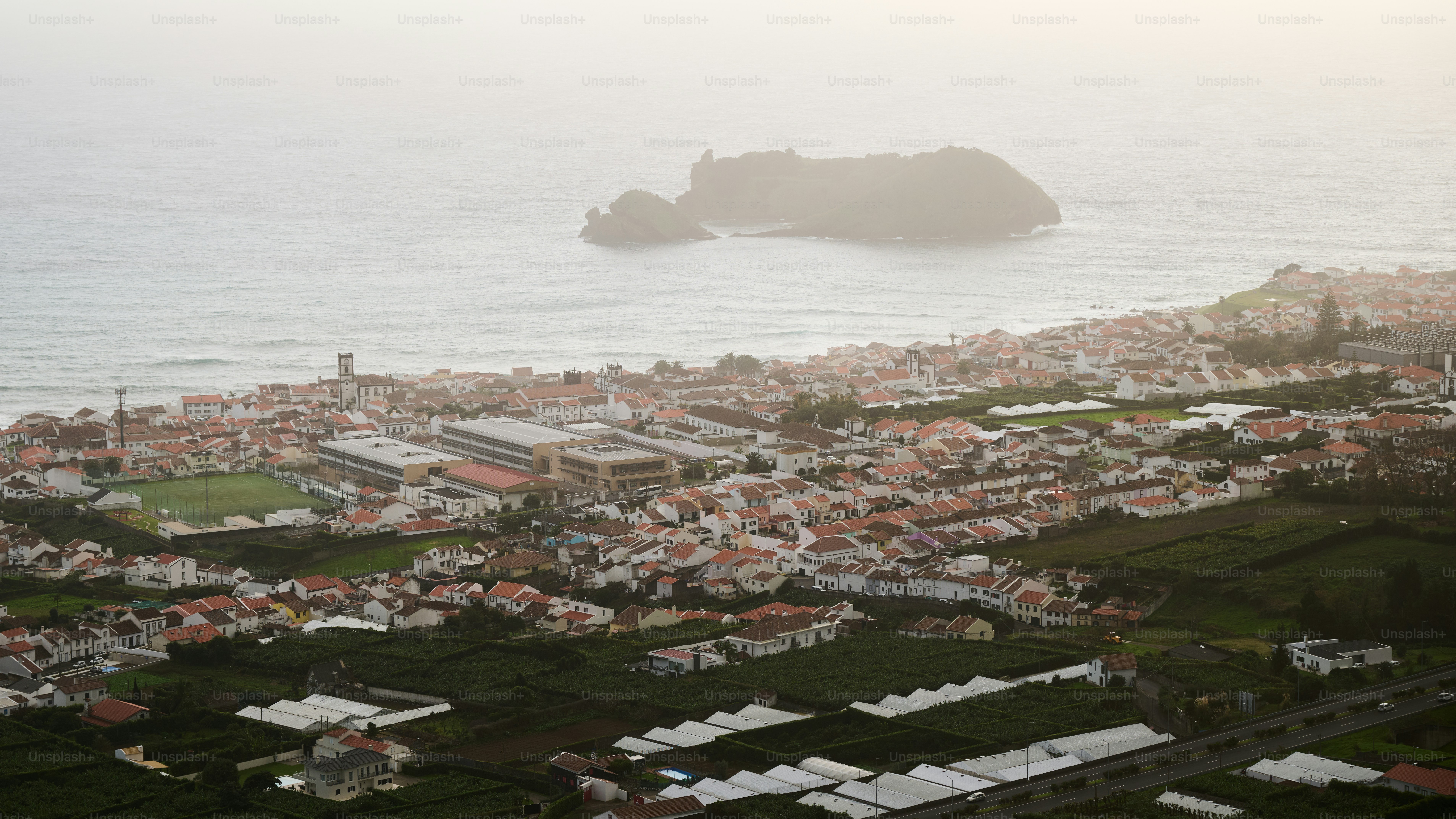 Coastal town with island visible offshore