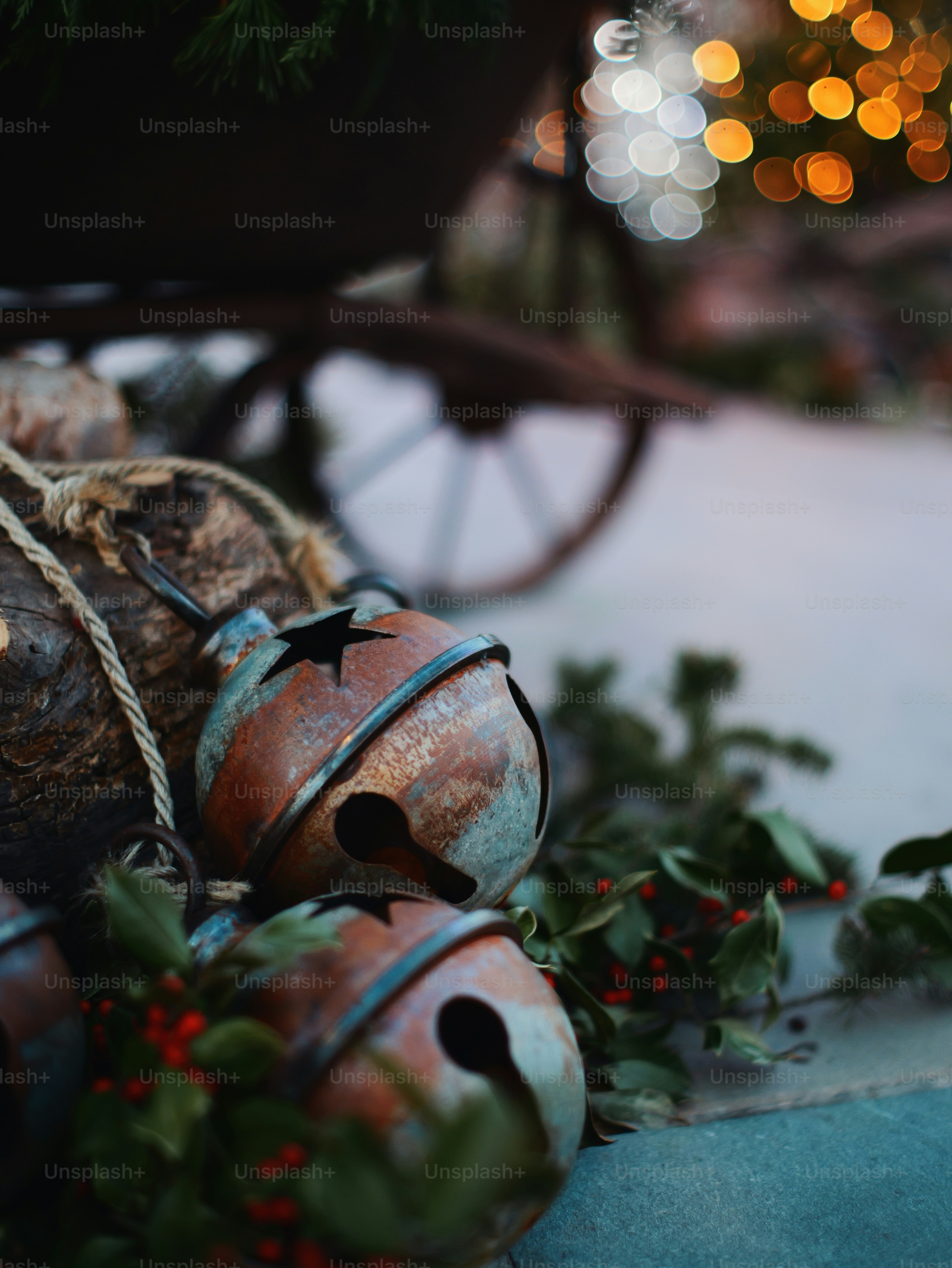 Rustic christmas bells with holly and pine needles