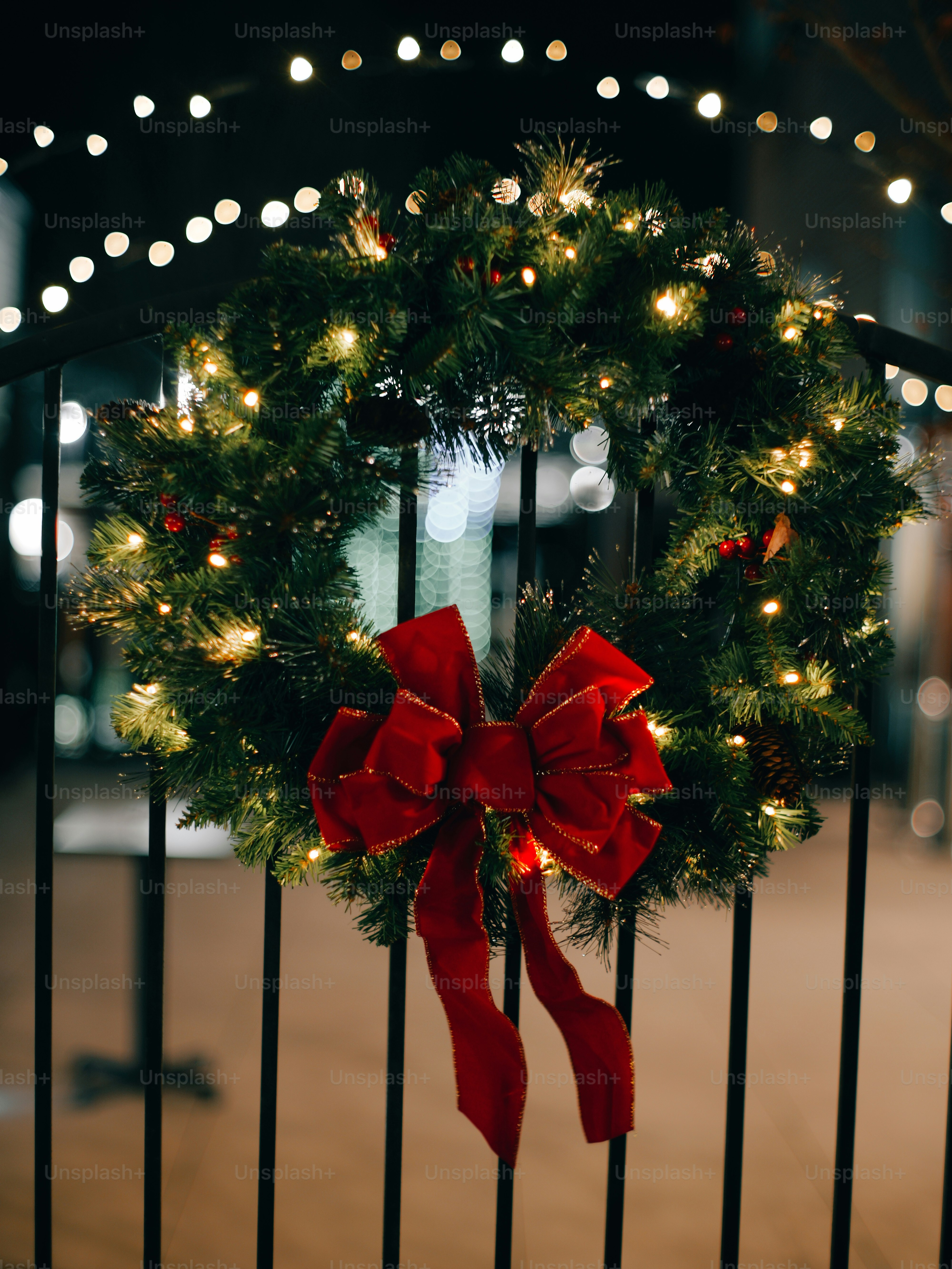 A festive christmas wreath with a red bow.