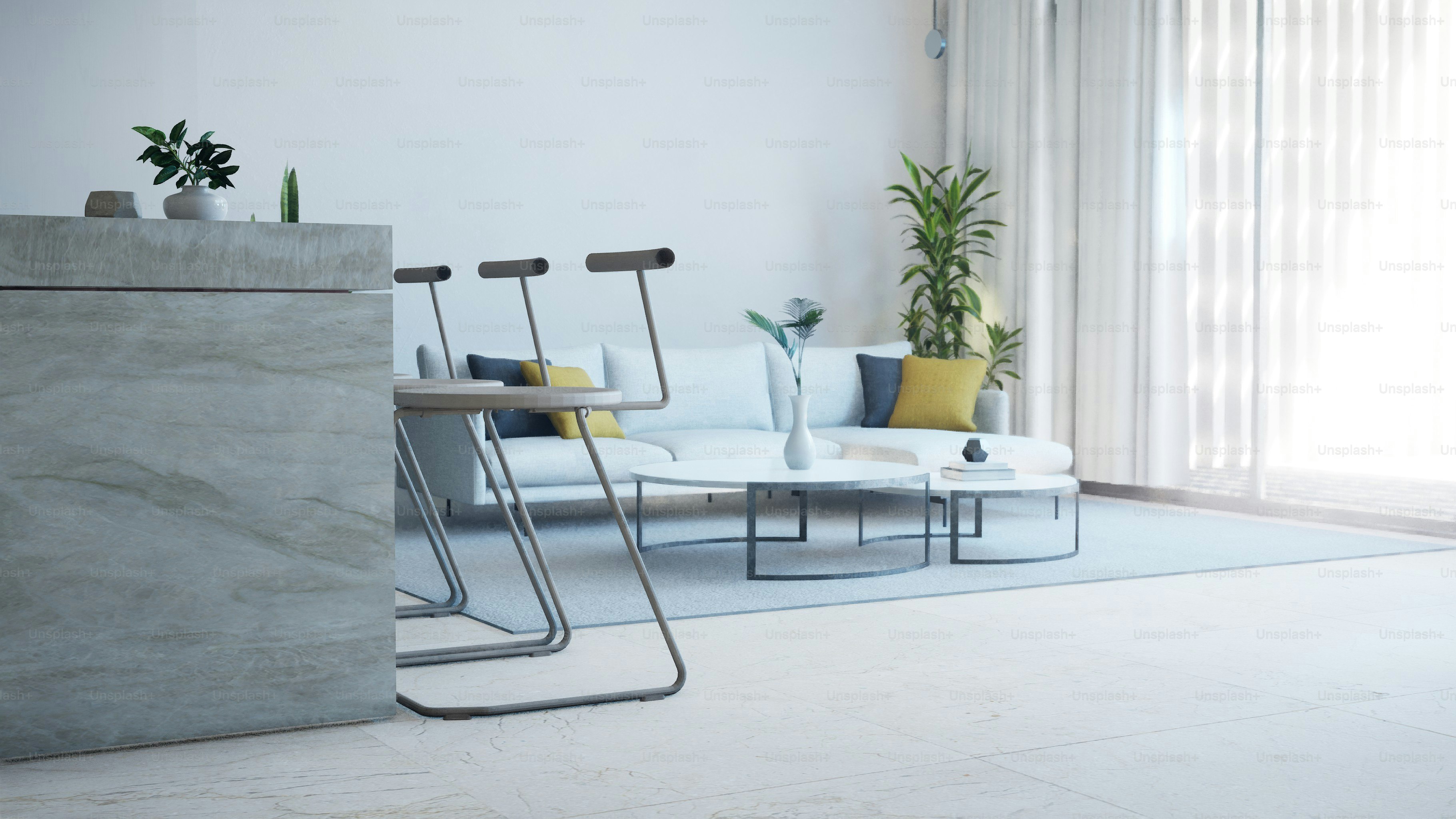 Modern living room with white sofa and marble table.