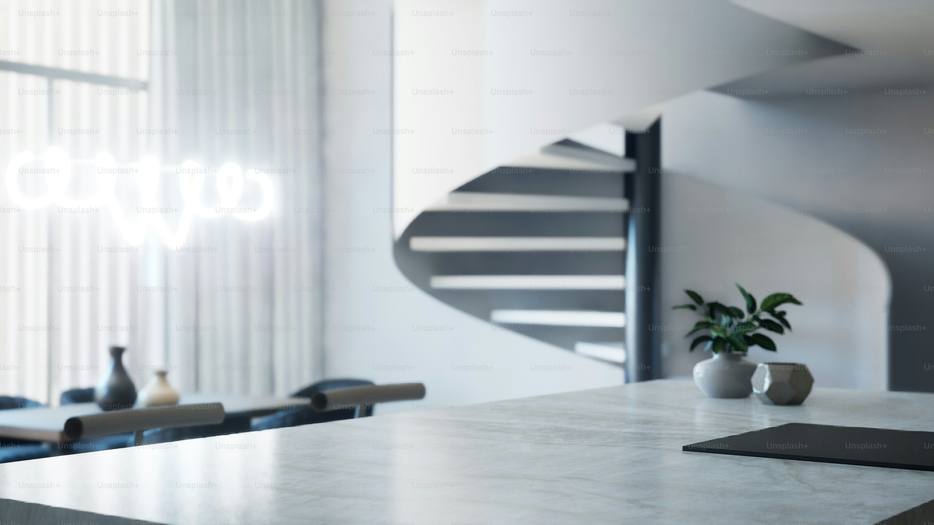 Modern interior with spiral staircase and neon sign