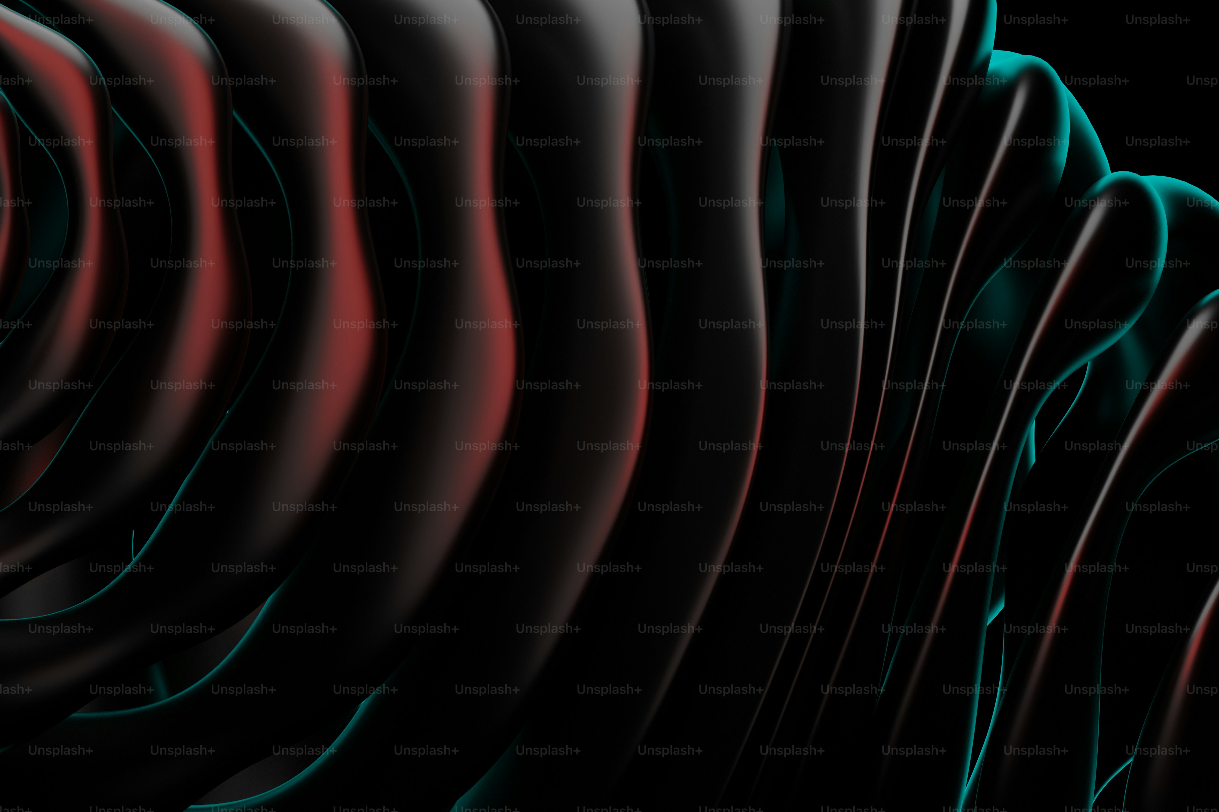 추상적인 어두운 물결무늬 형태에 빨간색과 청록색 조명이 어우러져 있습니다