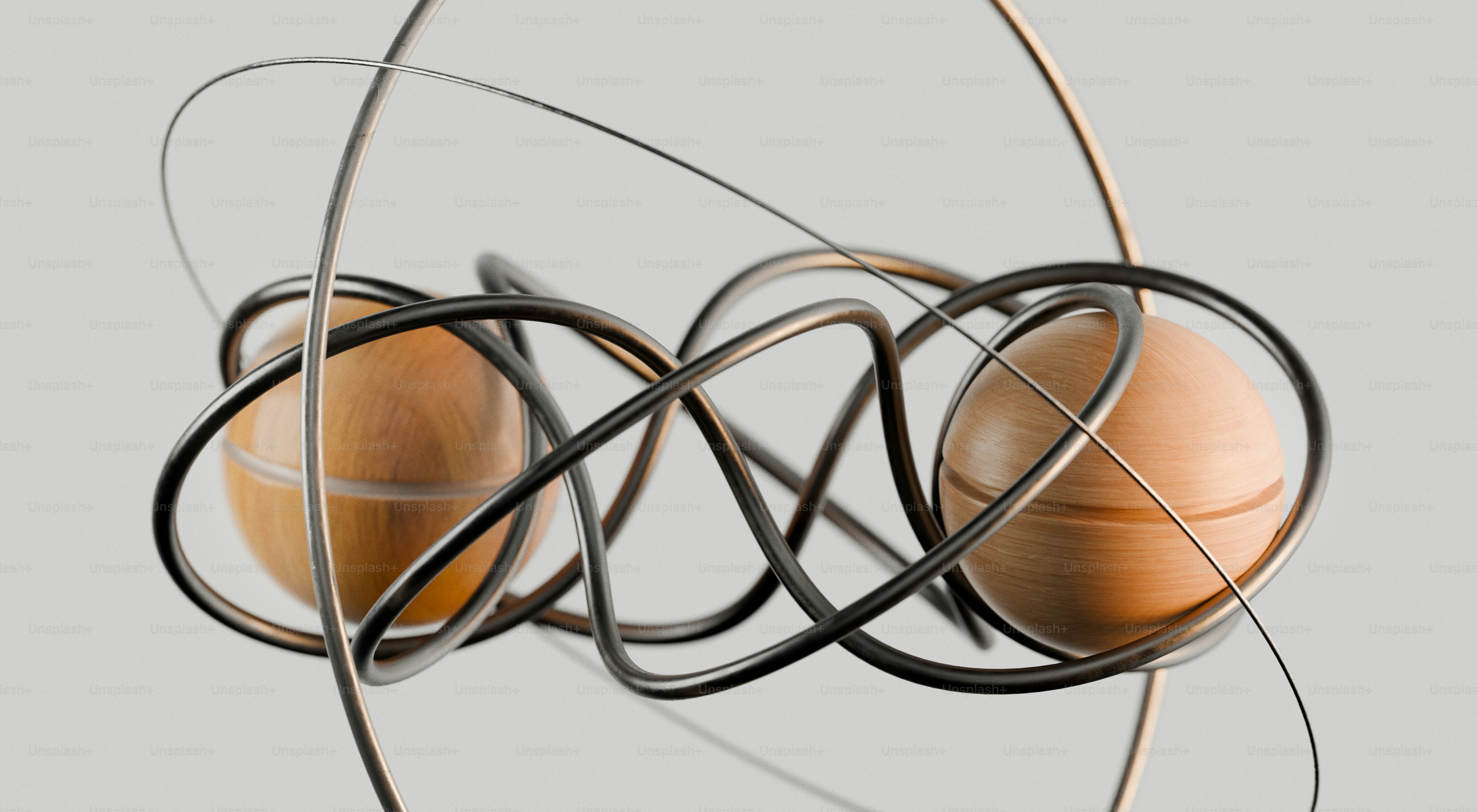 Two spheres intertwined with abstract metal wires photo – Abstract ...