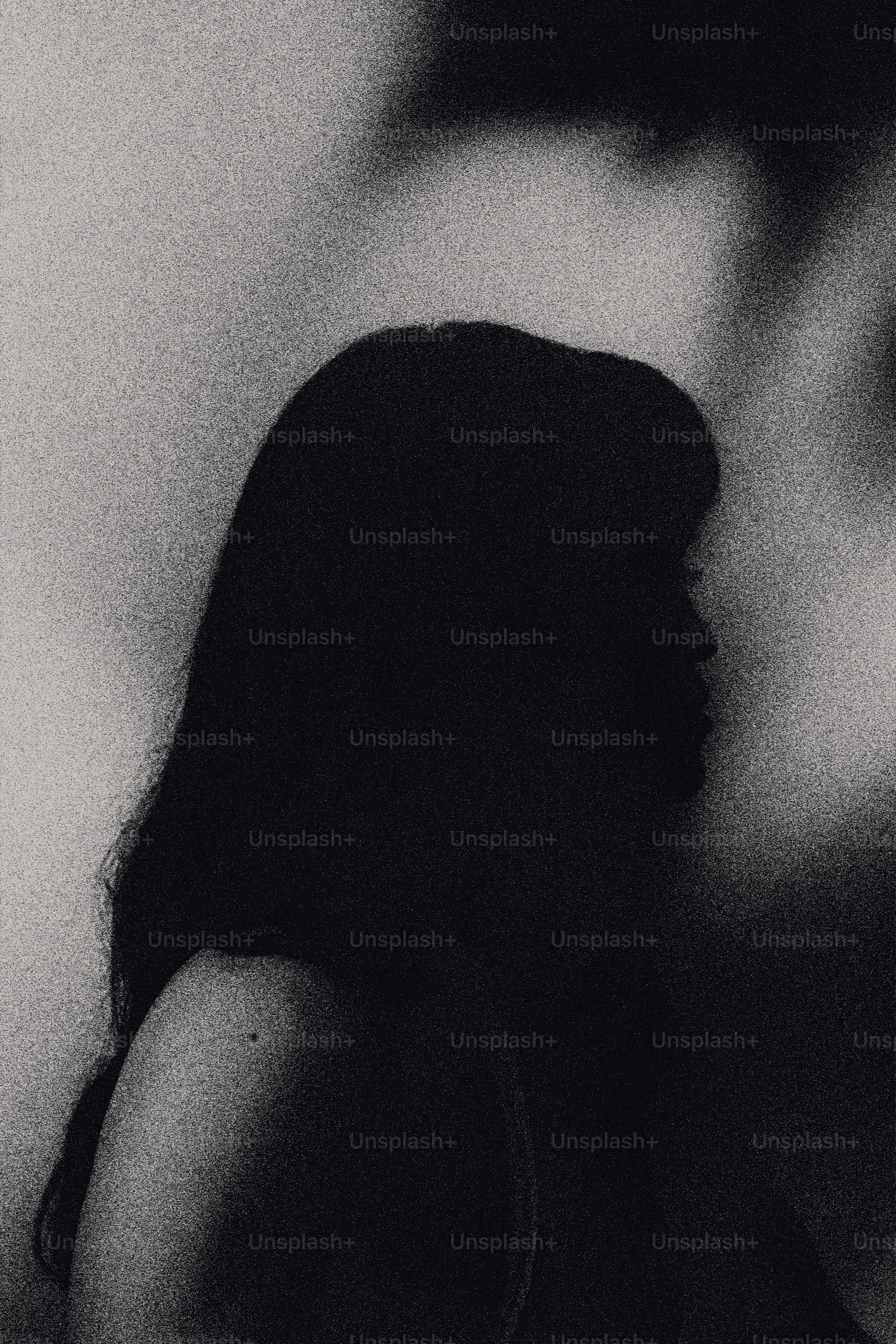 Silhouette of a woman with long hair