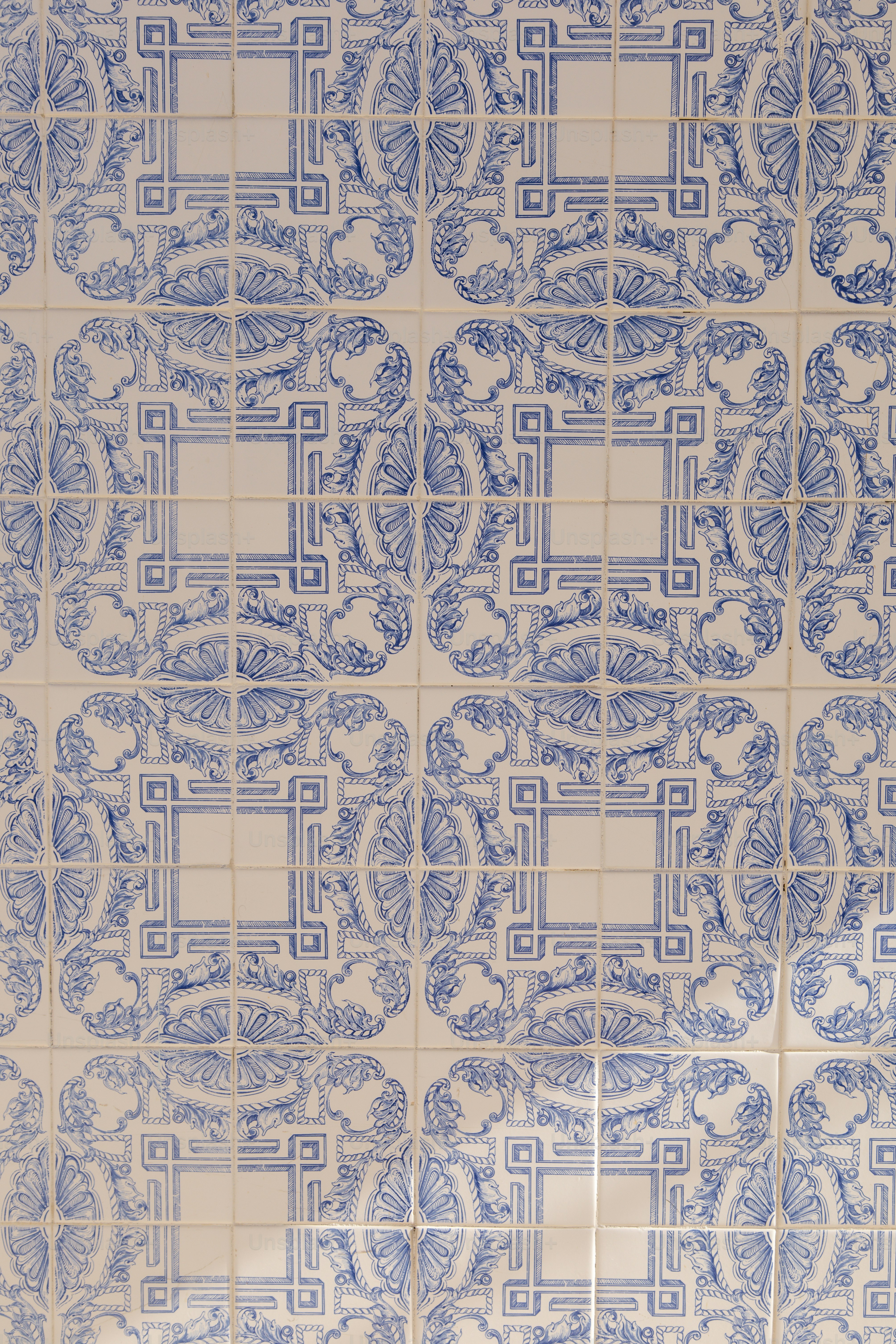 Blue and white patterned tiles on decorative tiles