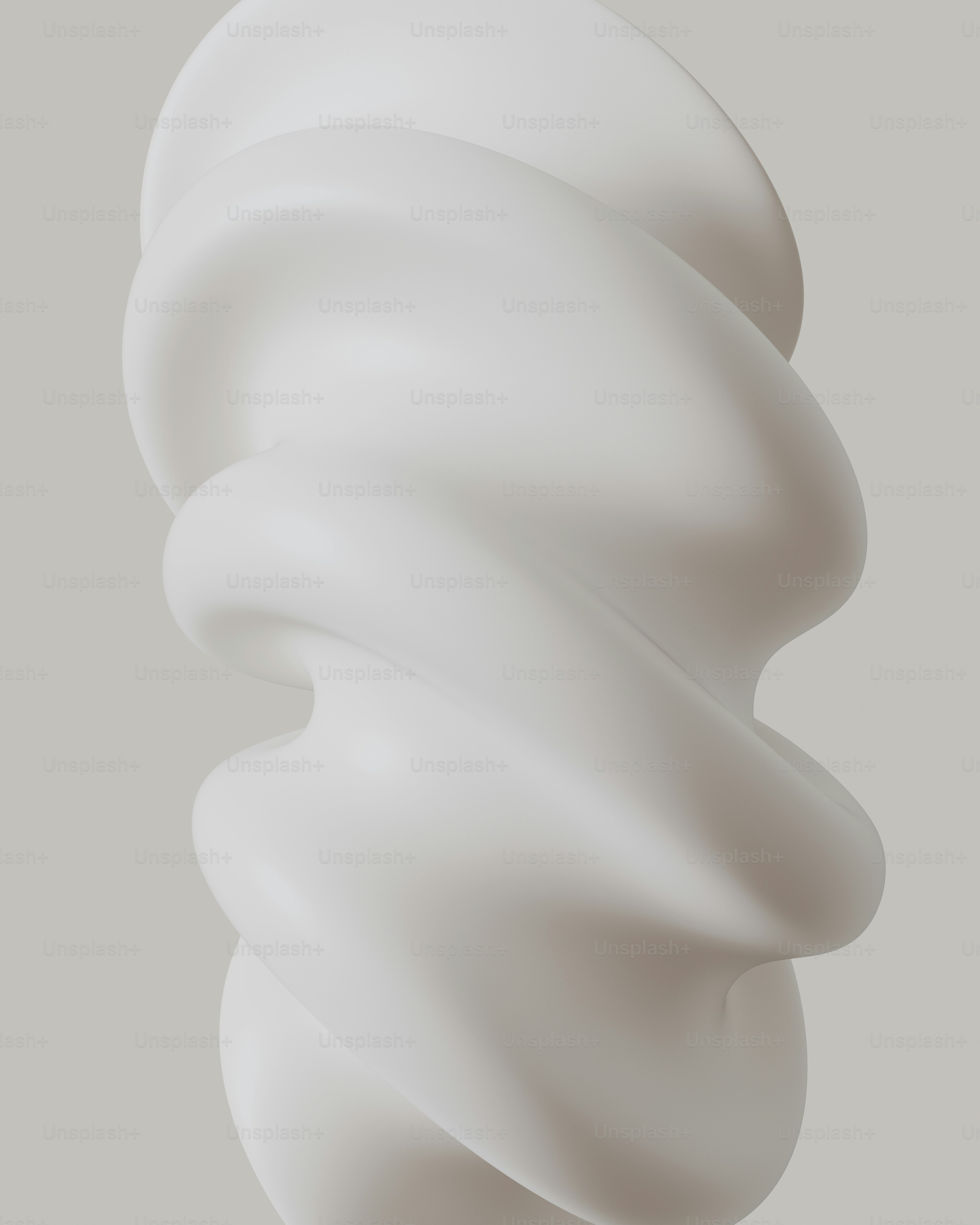 Abstract white sculpture with swirling form