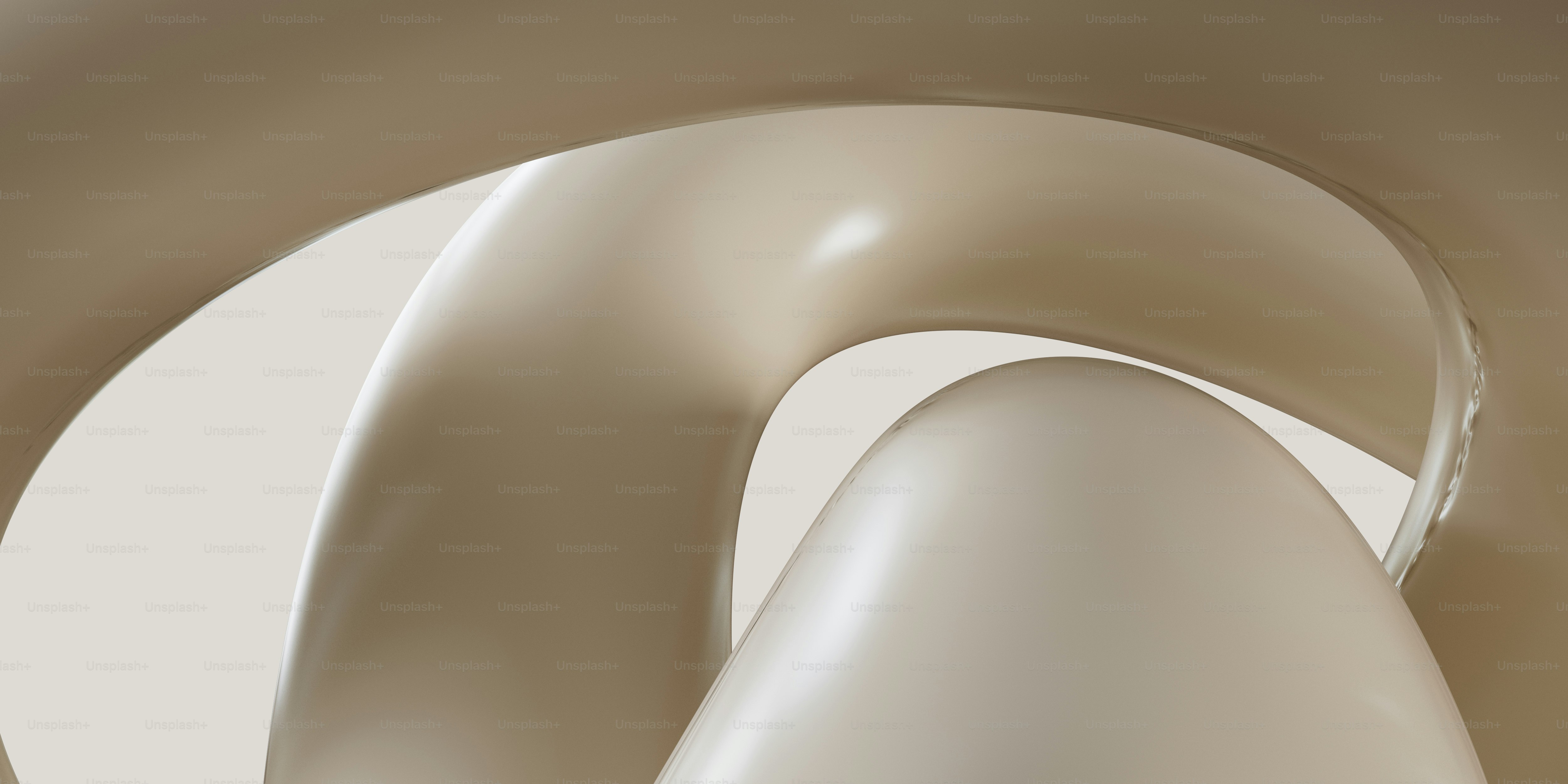Abstract smooth flowing shapes in neutral tones.