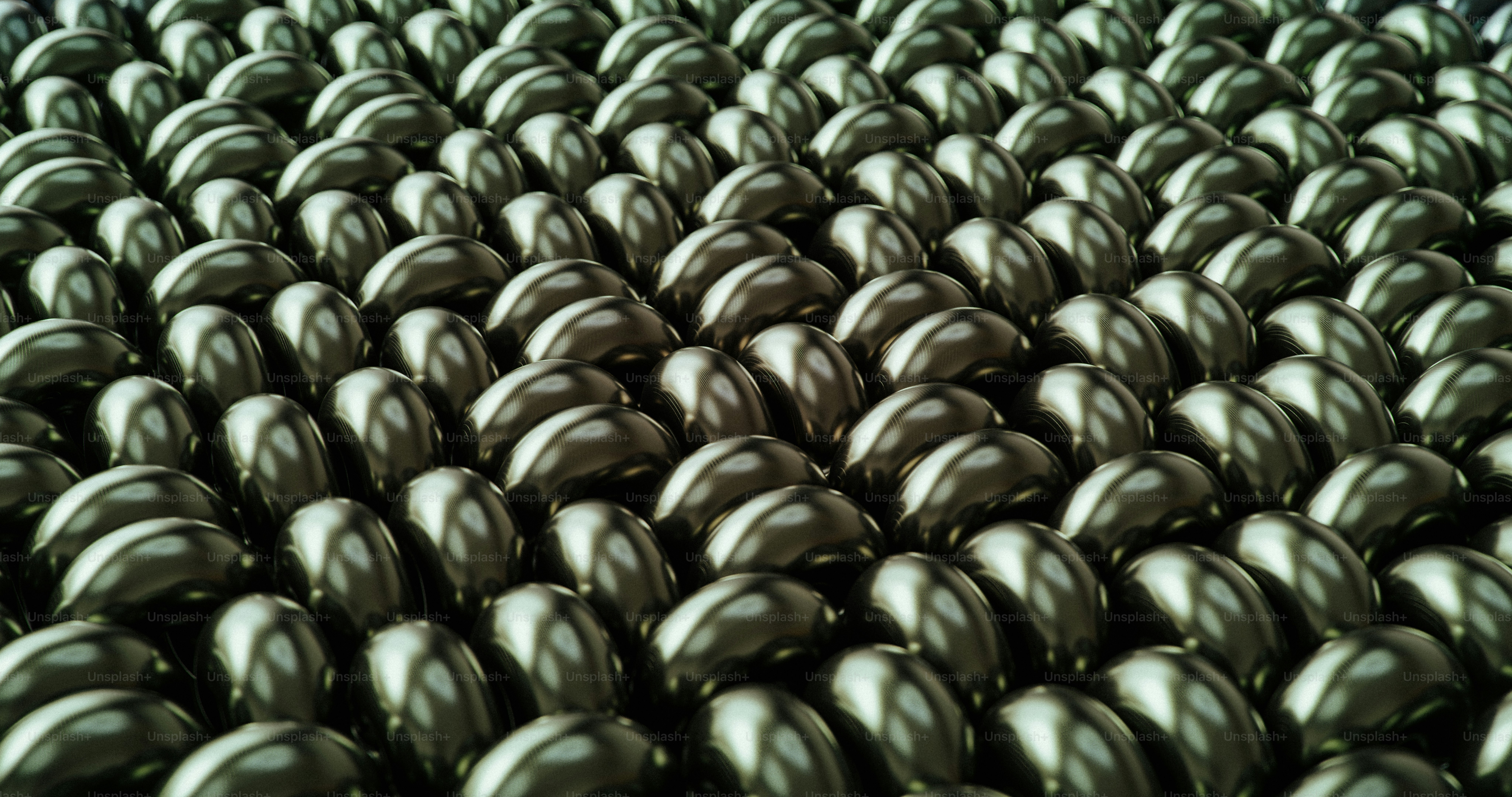Rows of metallic spheres arranged in a pattern photo – Wallpaper Image ...