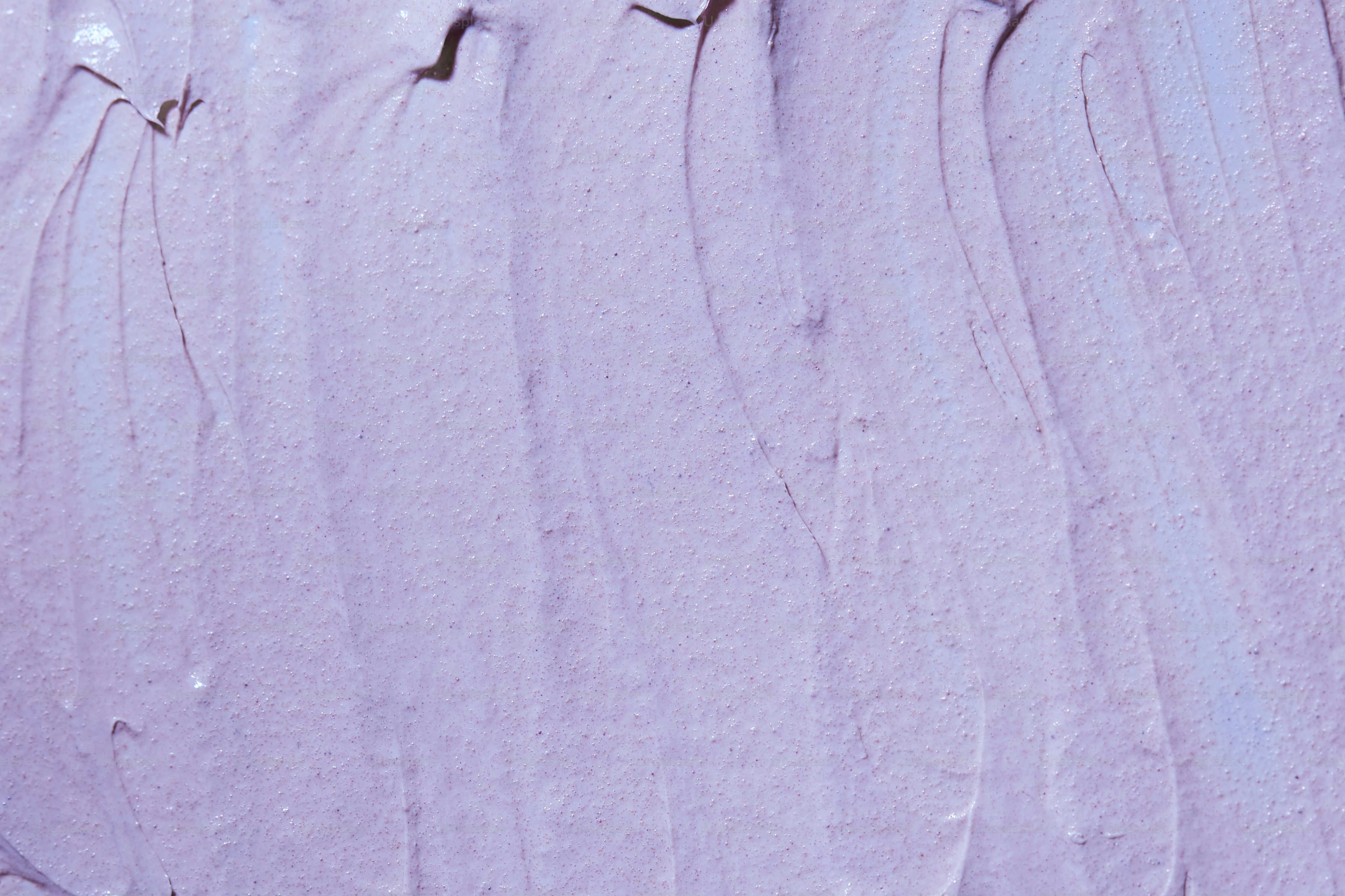 Close-up of light purple frosting with textured swirls. photo – Texture ...