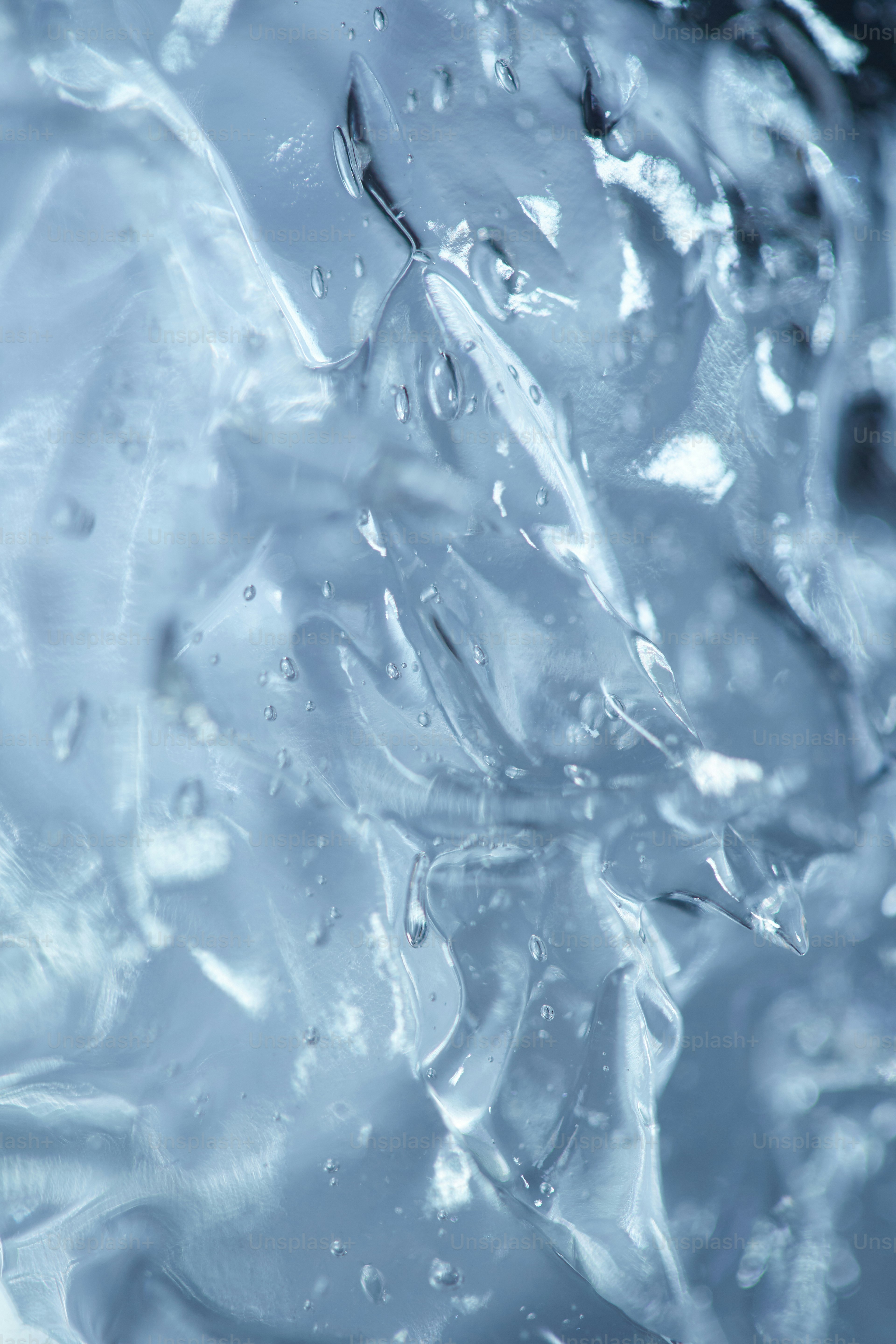 Abstract blue gel with small bubbles