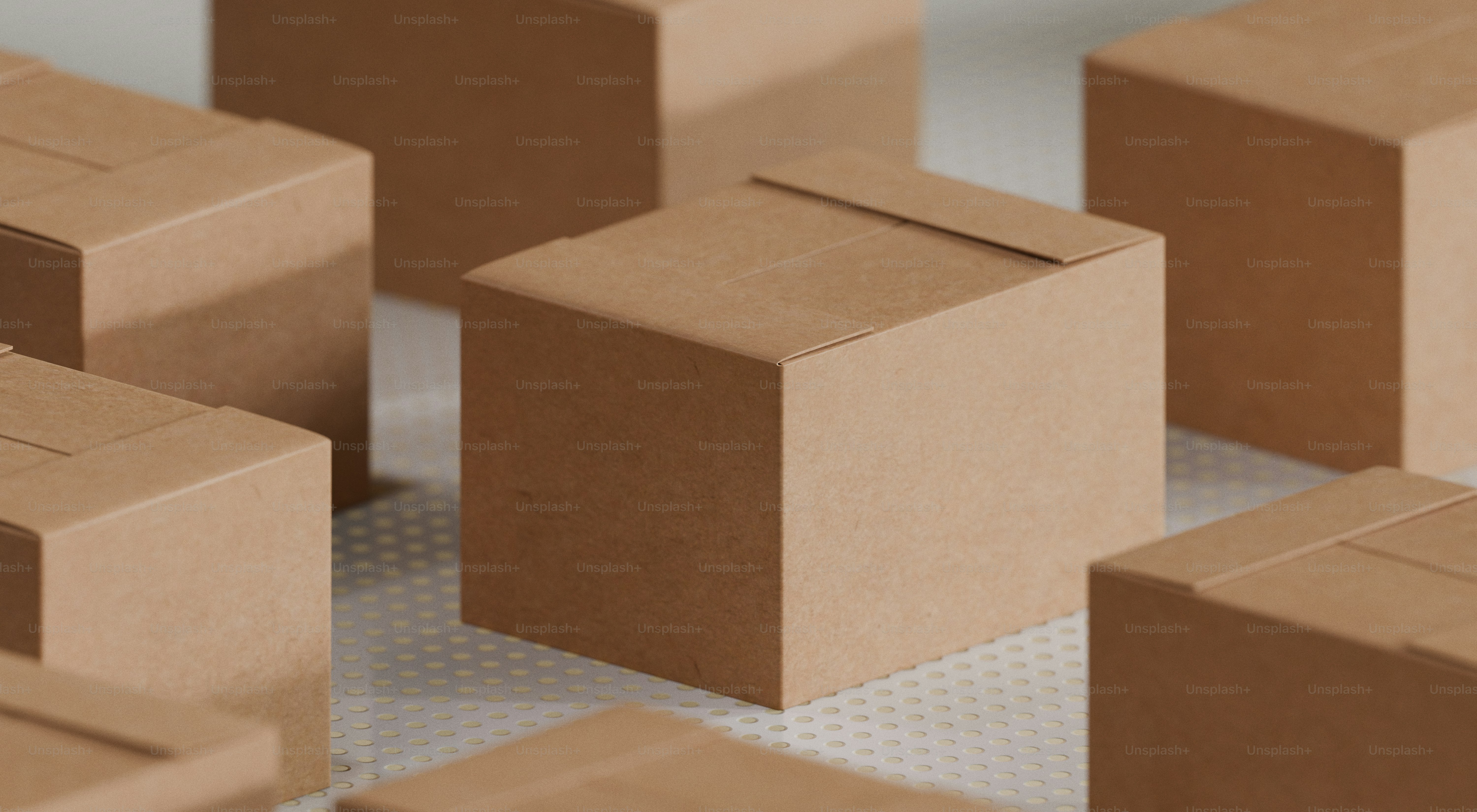 Several closed cardboard boxes arranged on a surface.