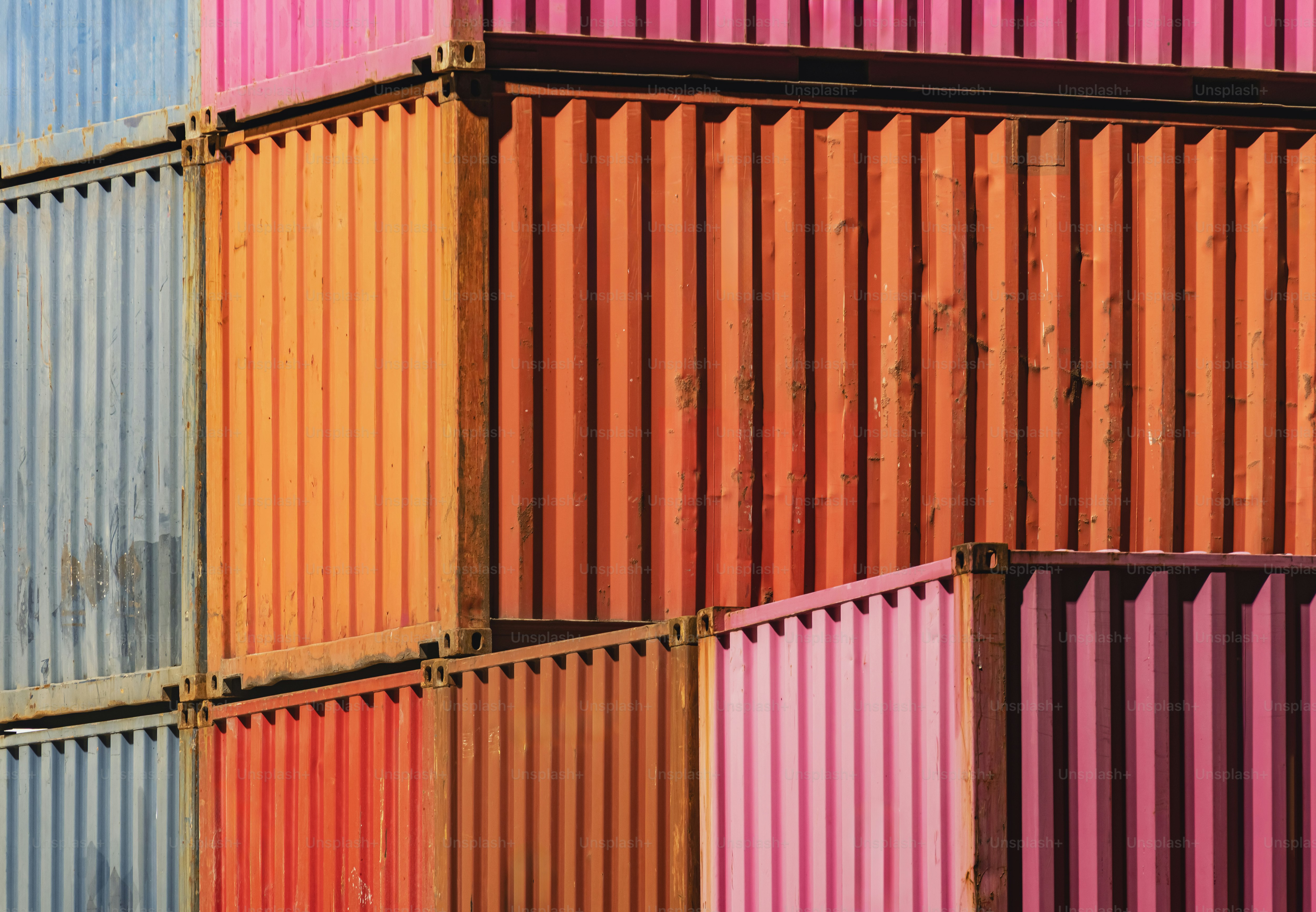 Containers are stacked at a cargo terminal dock. photo – Business Image ...