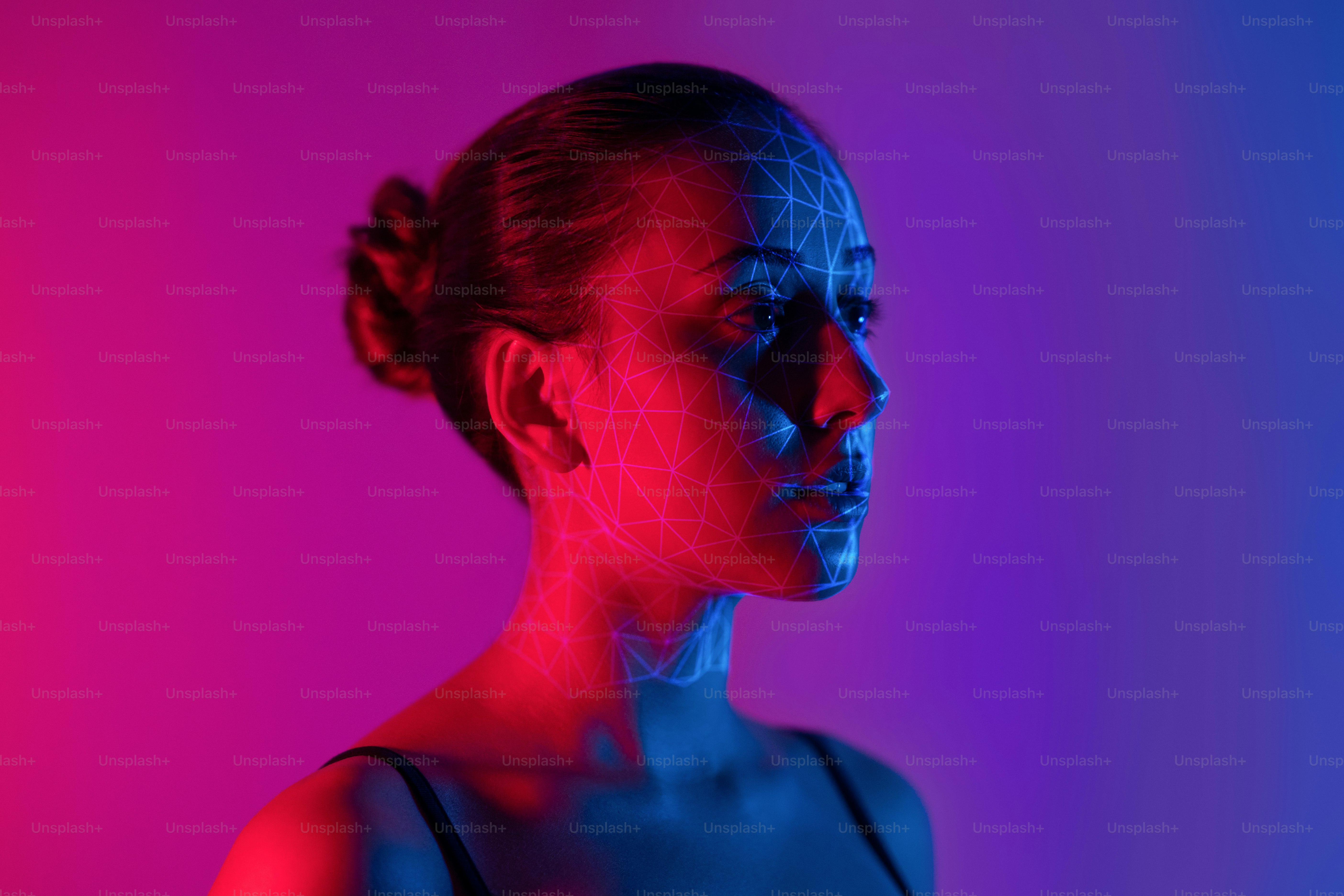 Young female human face with 3d mesh.