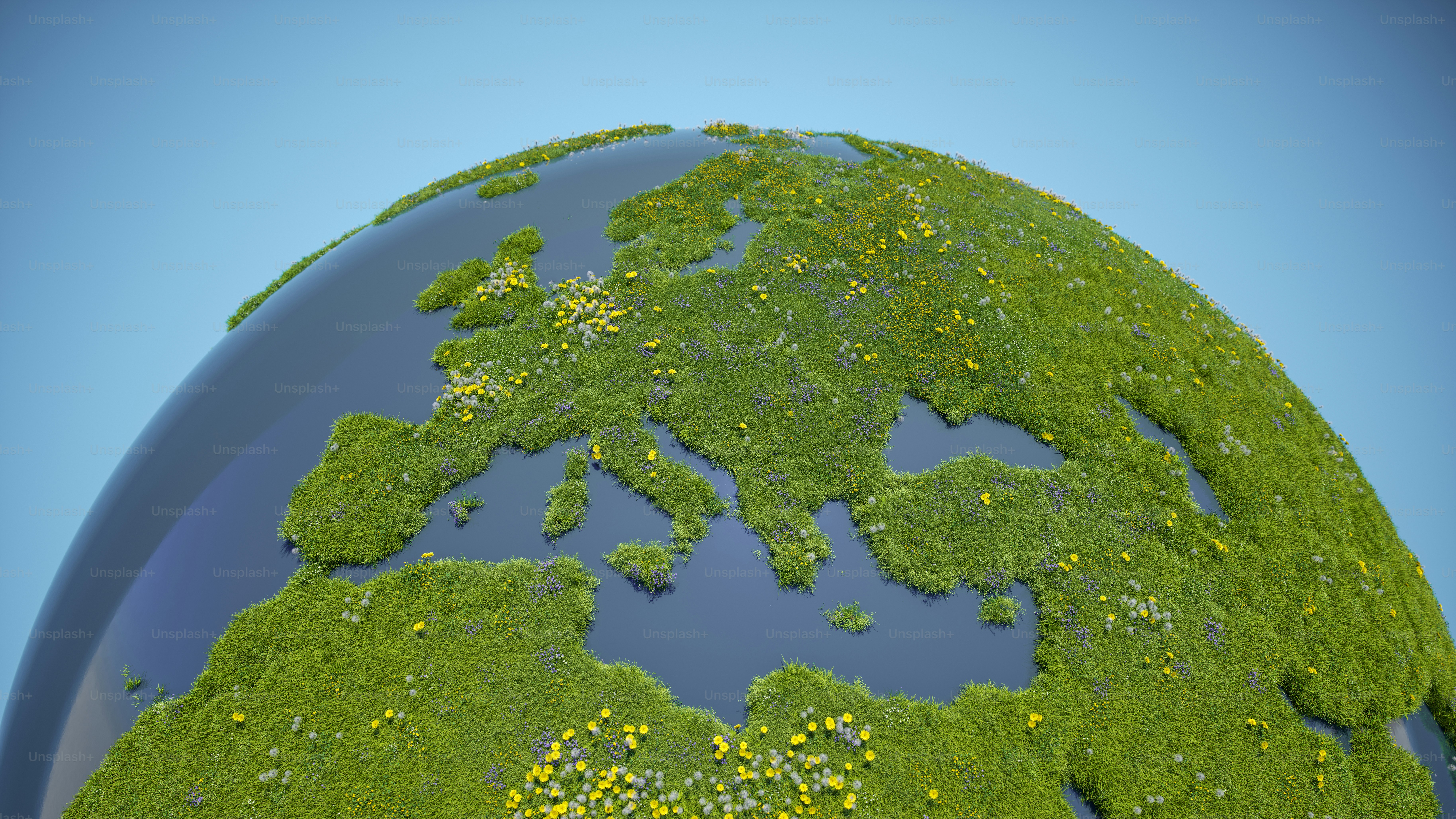 A detailed, conceptual illustration of a green globe covered in lush, vibrant grass, interspersed with a variety of colorful flowers blooming across its surface.(World Map Courtesy of NASA: https://visibleearth.nasa.gov/view.php?id=55167)