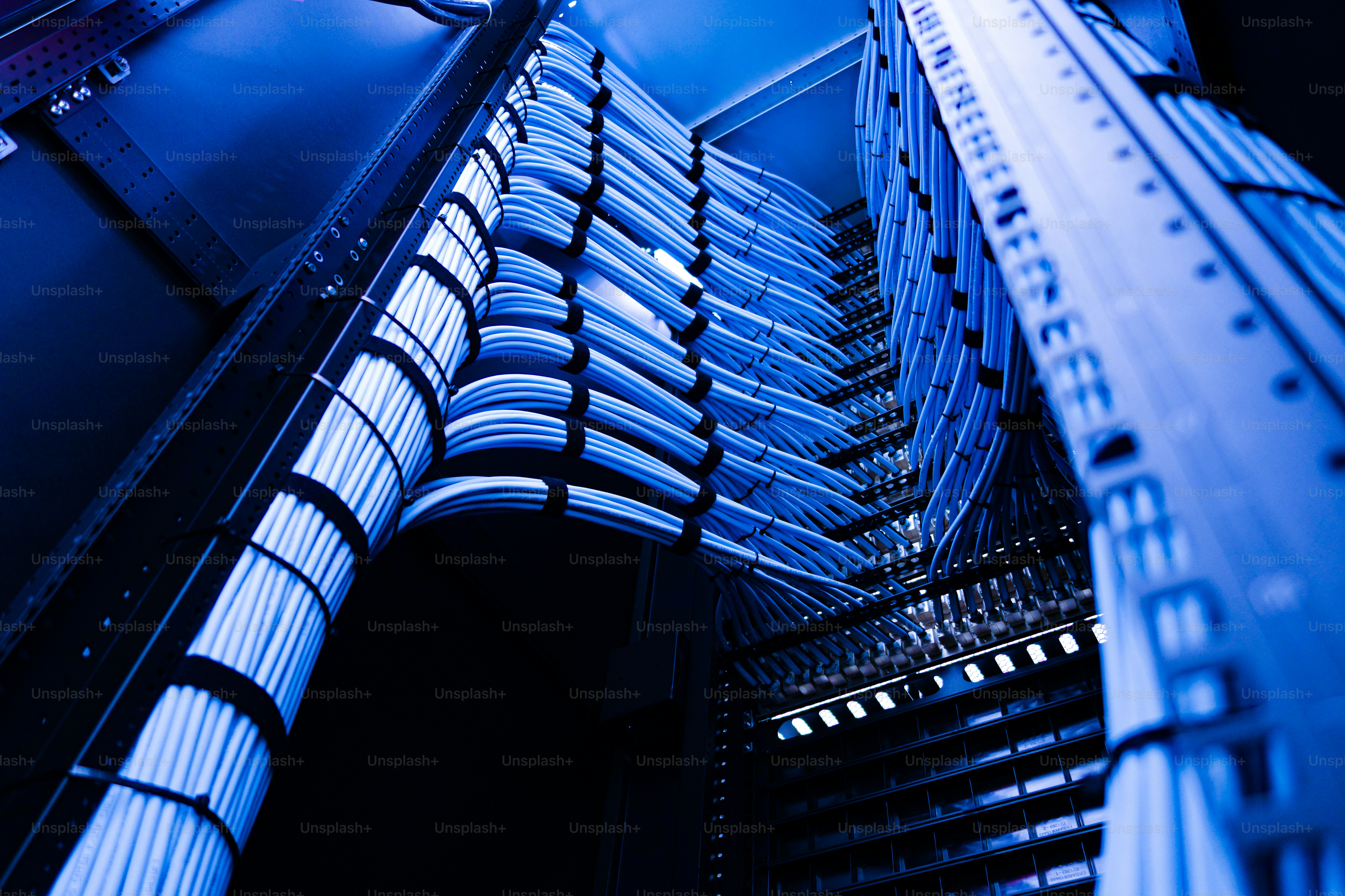 A visually striking view of organized network cables in a data center ...