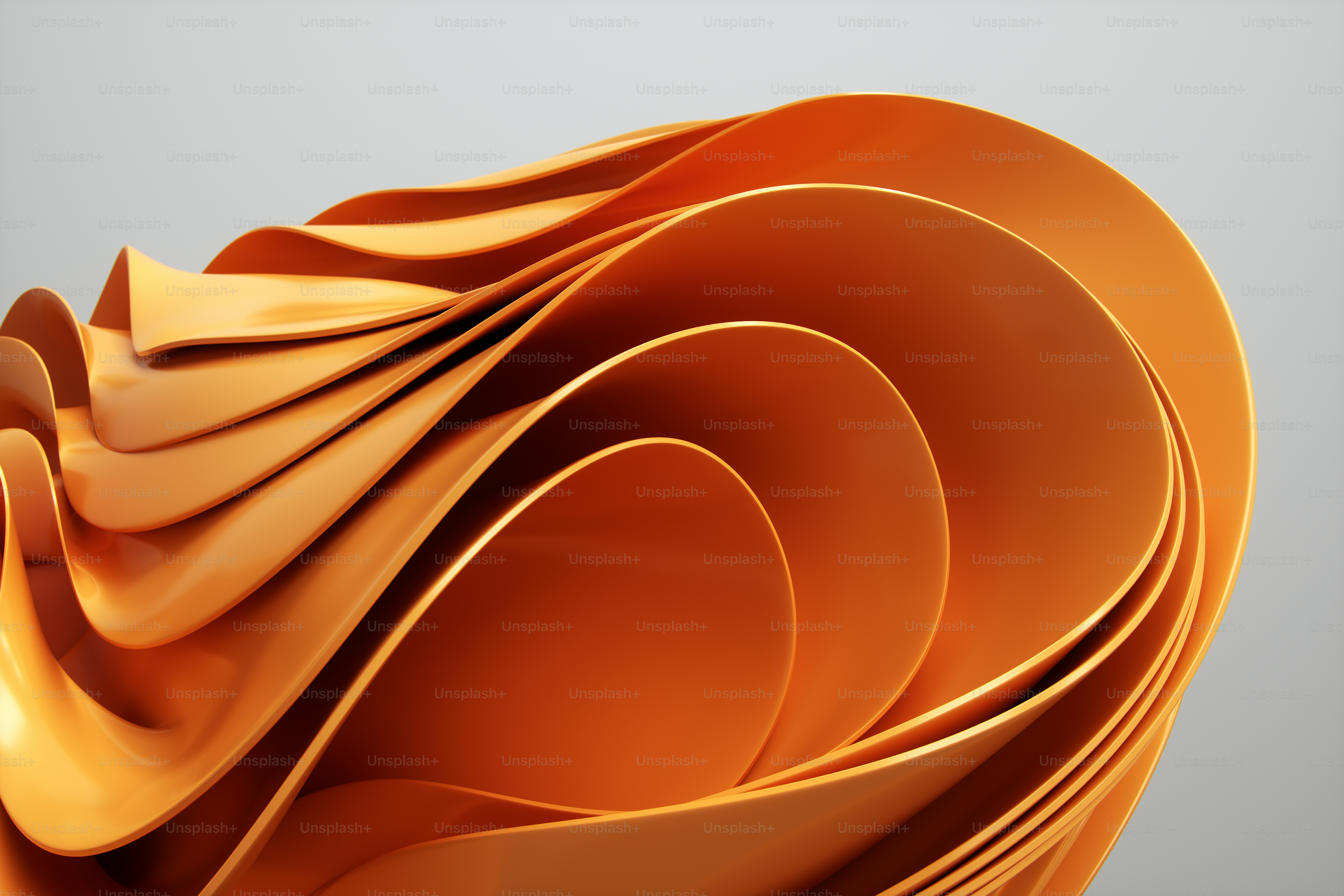 An abstract design featuring flowing, layered forms in vibrant orange hues.