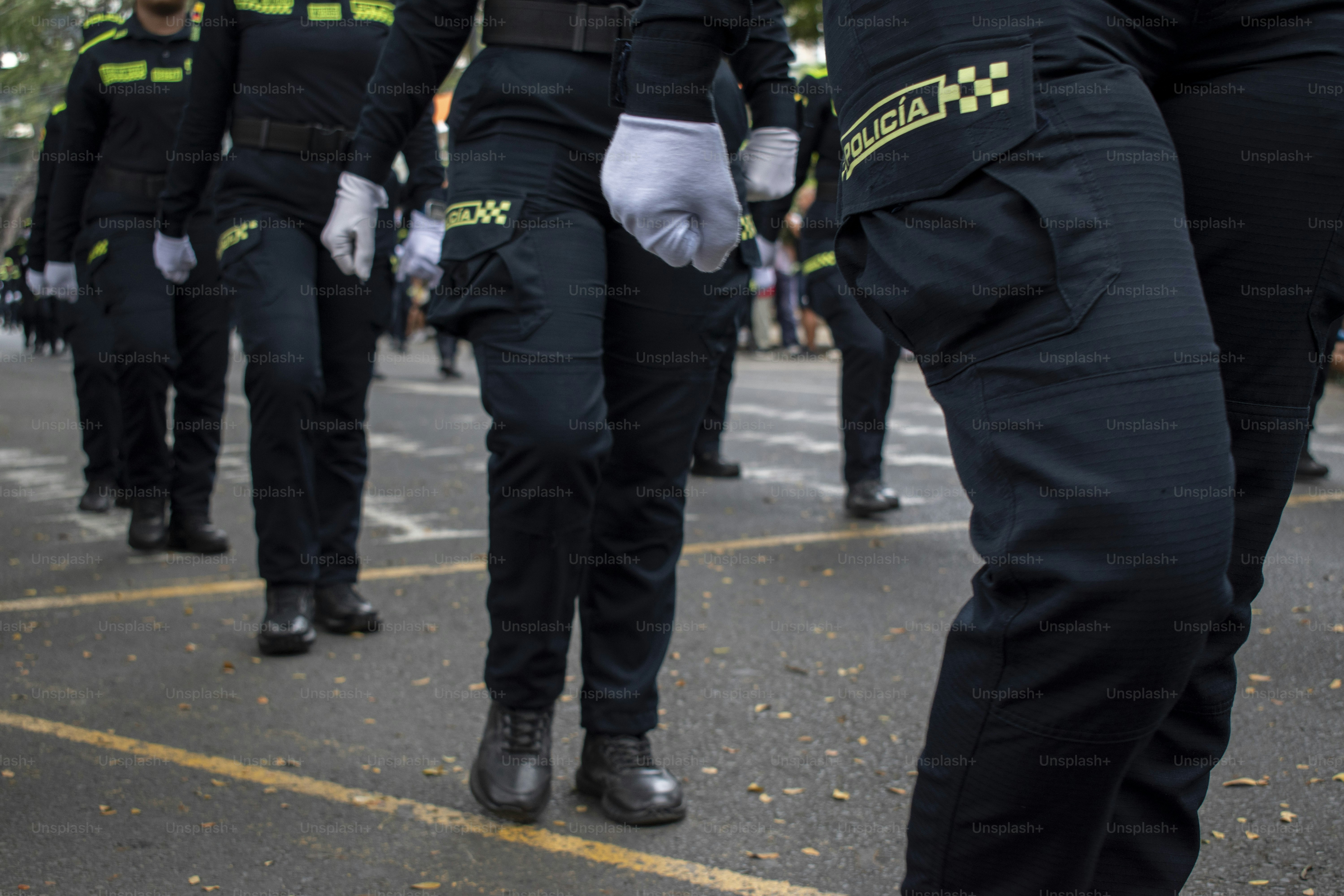Police unit marching on the street, Colombian police parade, Armed forces demonstration of discipline. High quality photo