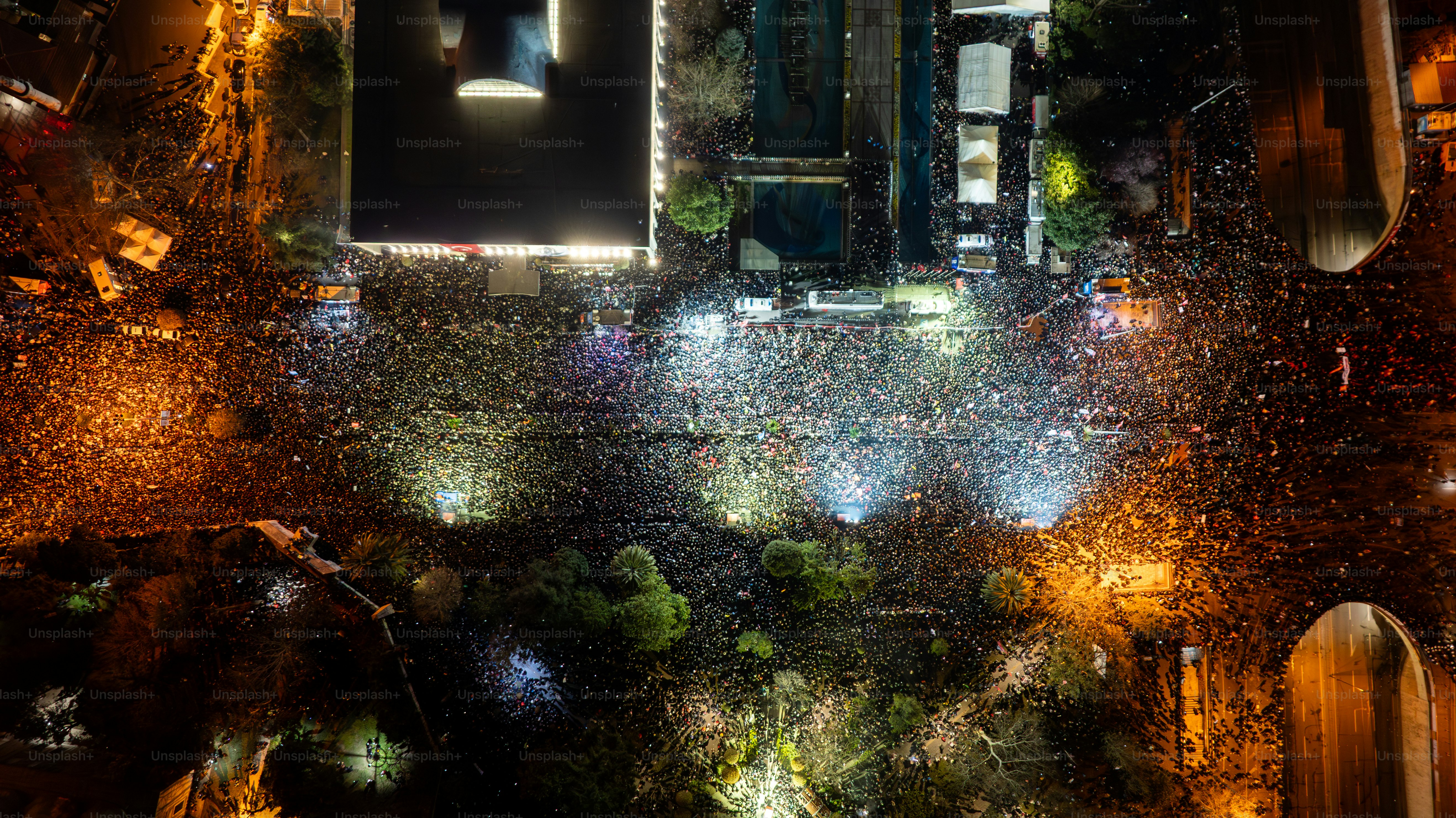 Thousands of people protest against the arrest of Ekram Imamoğlu in front of the Istanbul Metropolitan Municipality in Sarachan on March 20, 2025 in ıstanbul, Türkiye. Drone.