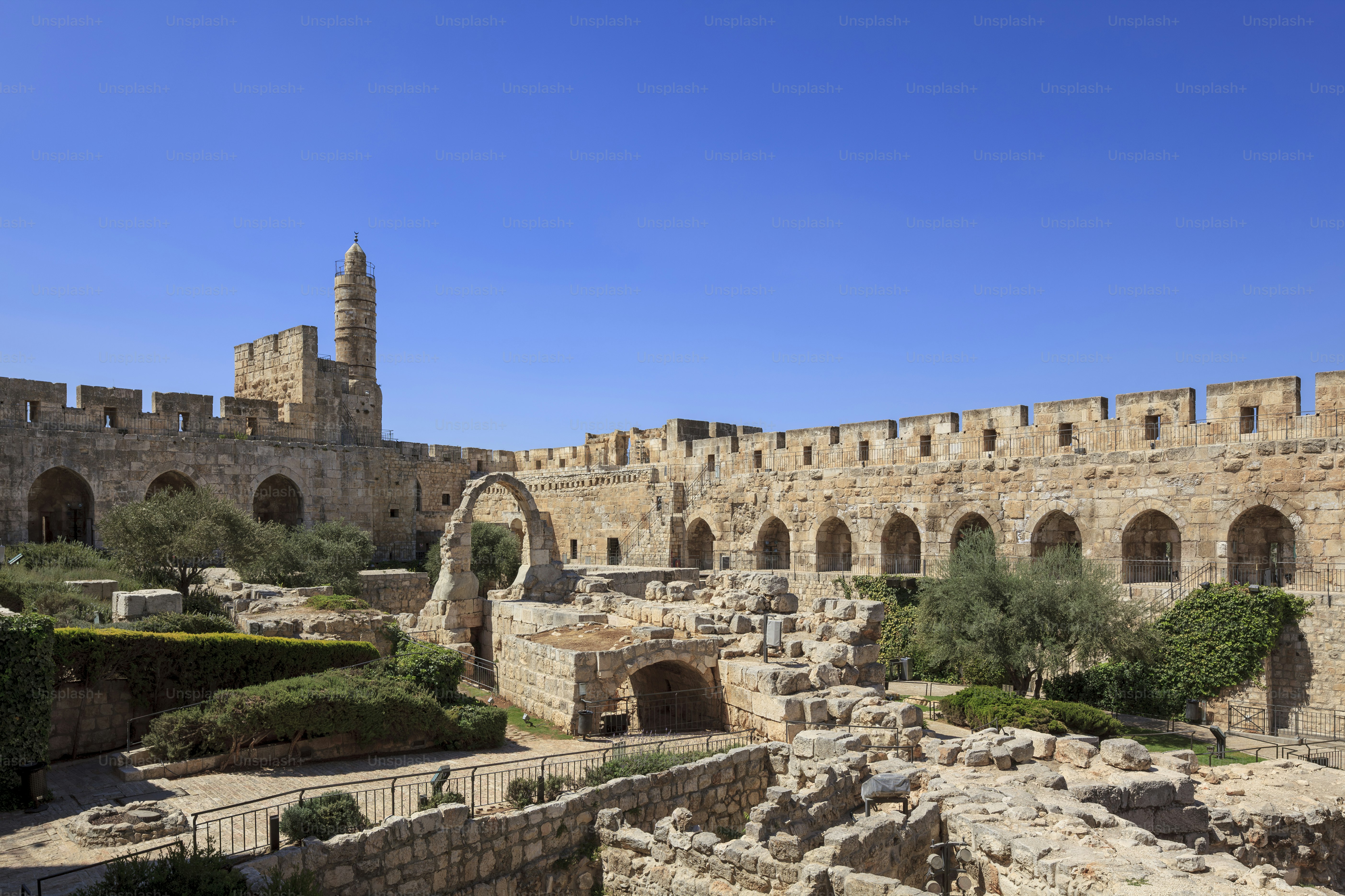 The courtyard of the Tower of David near Jaffa Gate in Jerusalem’s Old City features archaeological remains and stone corridors that reflect the site's history as a fortress.