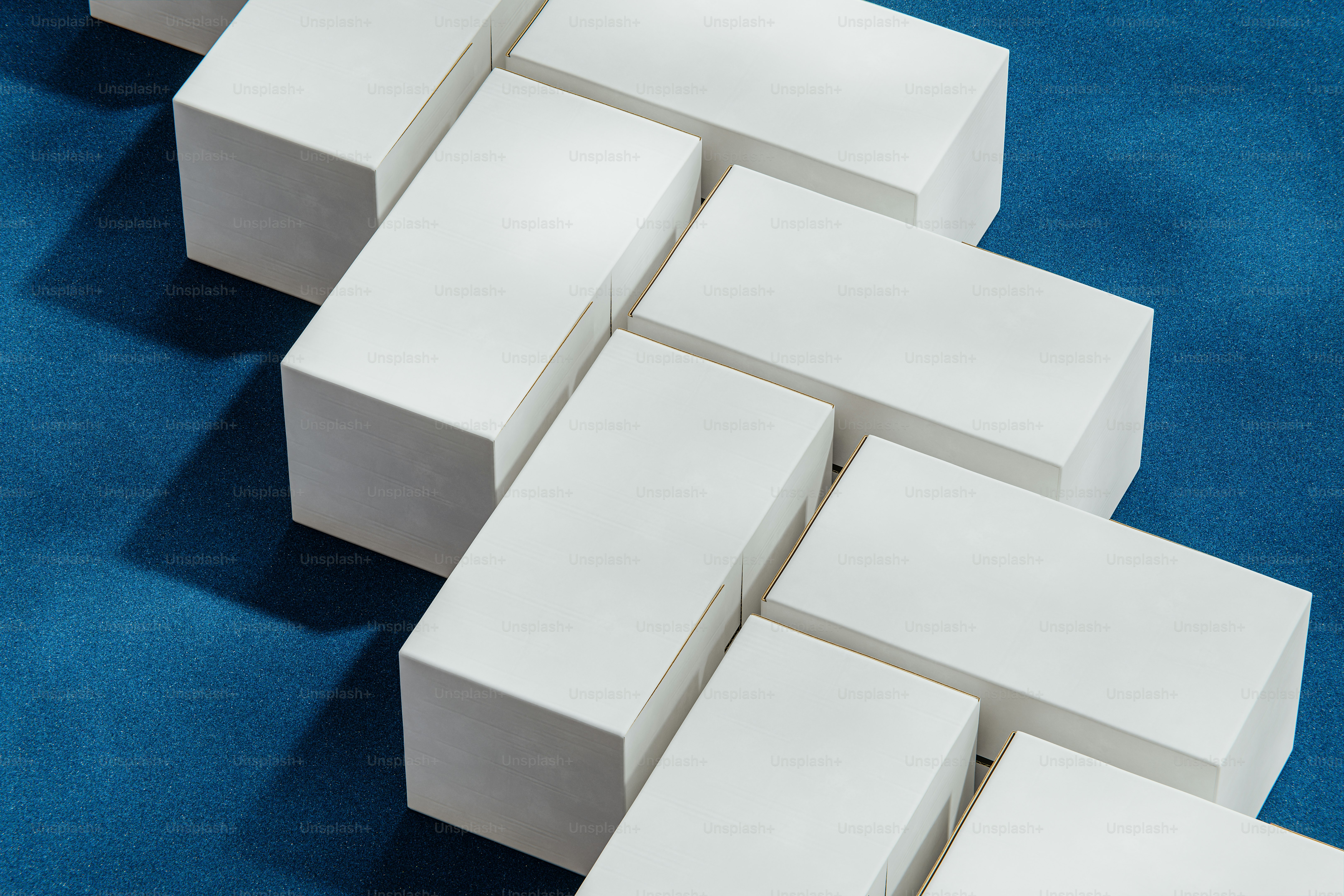 White rectangular blocks arranged in a herringbone pattern. photo ...