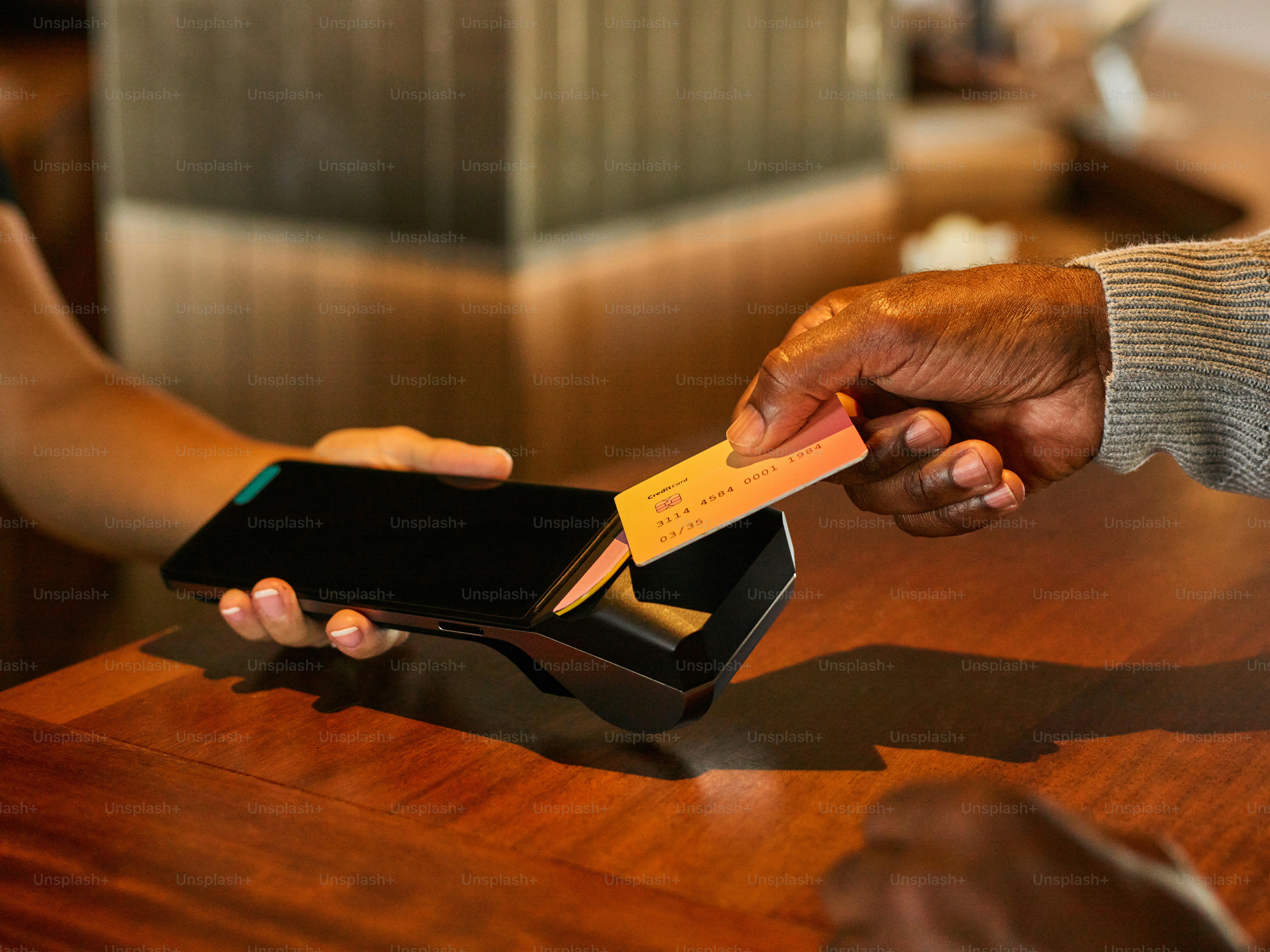 Customer paying with credit card at point of sale