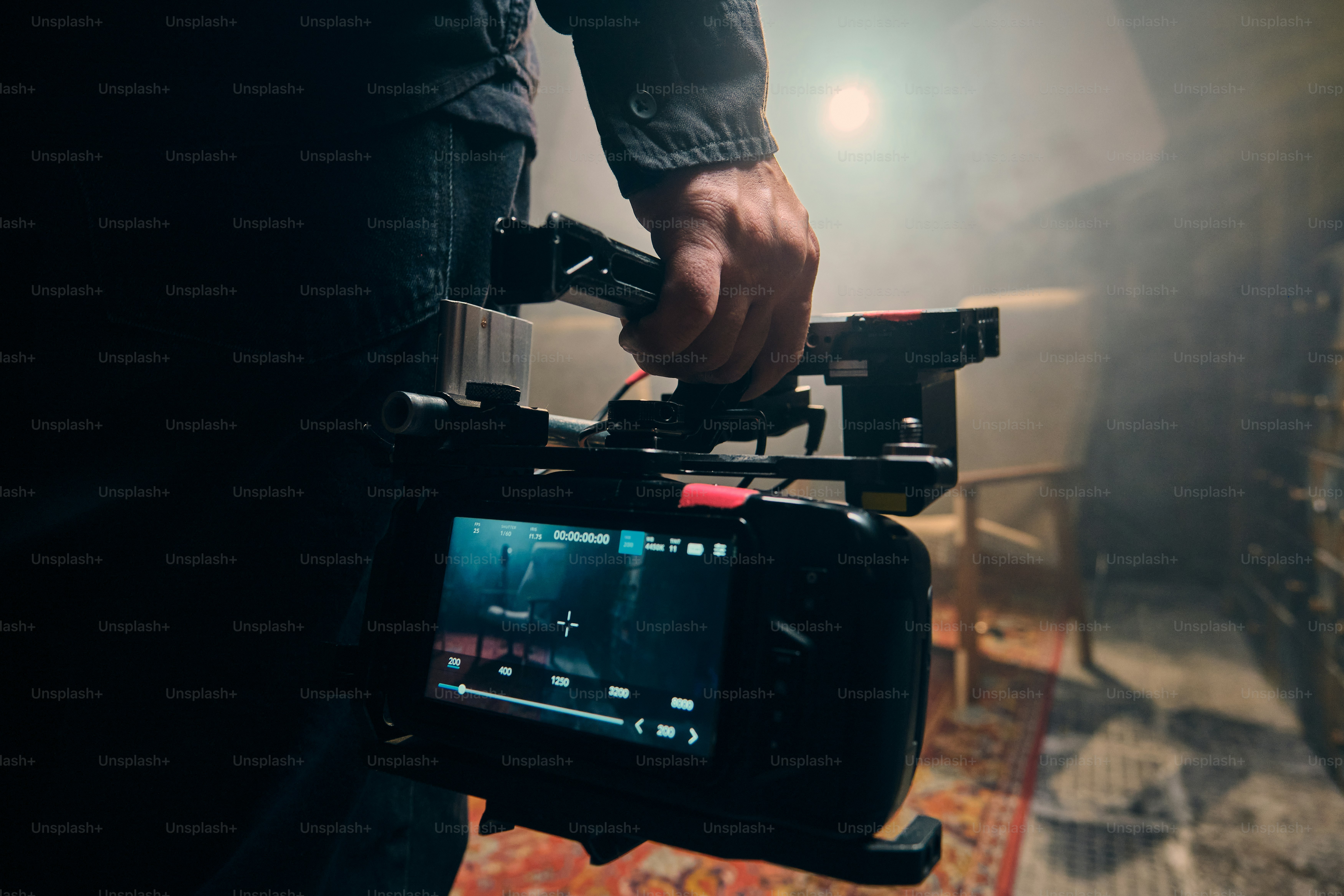 Filmmaker holding professional video camera rig
