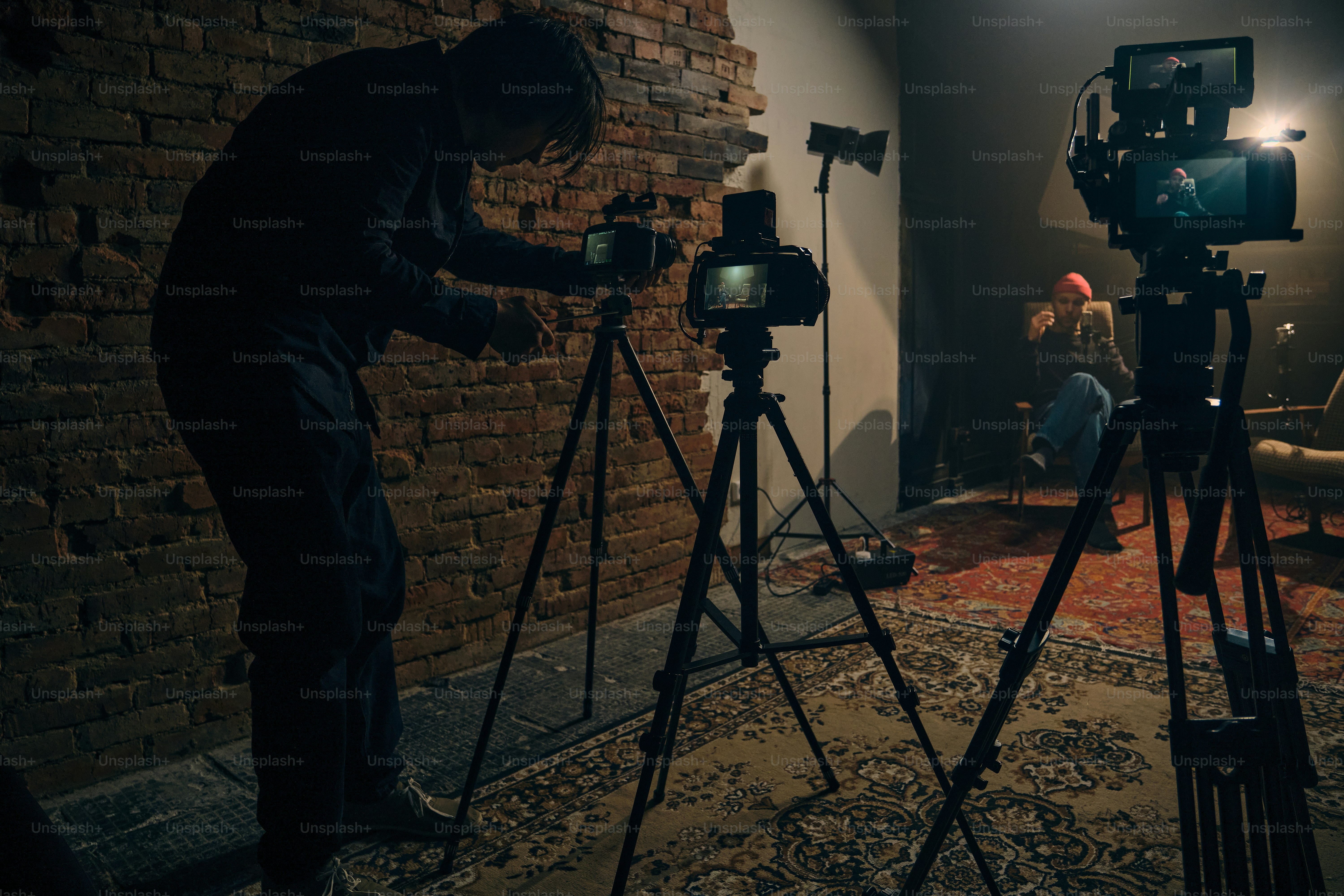 Filming setup with cameras and lighting equipment