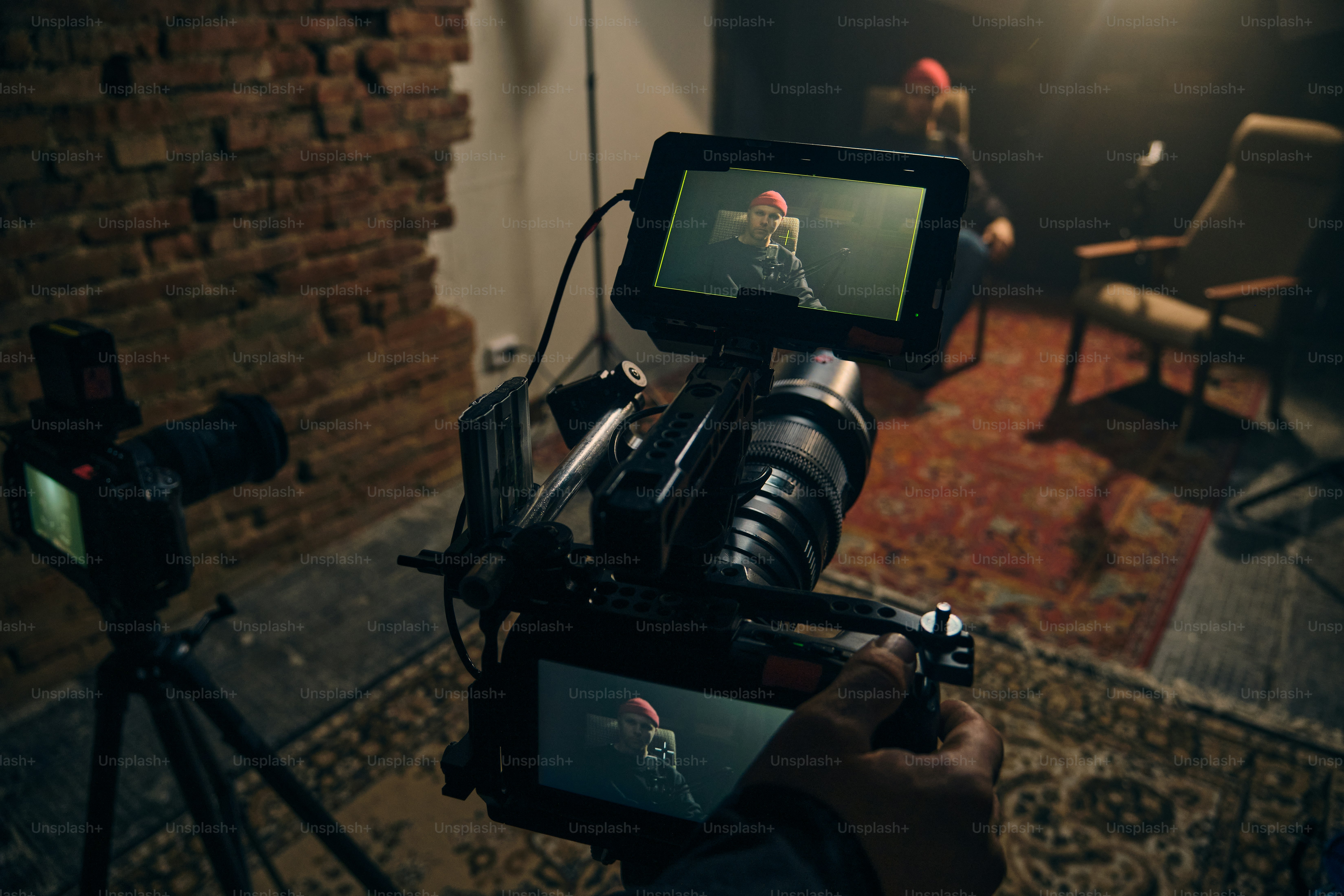 Filming a live performance with professional camera equipment.