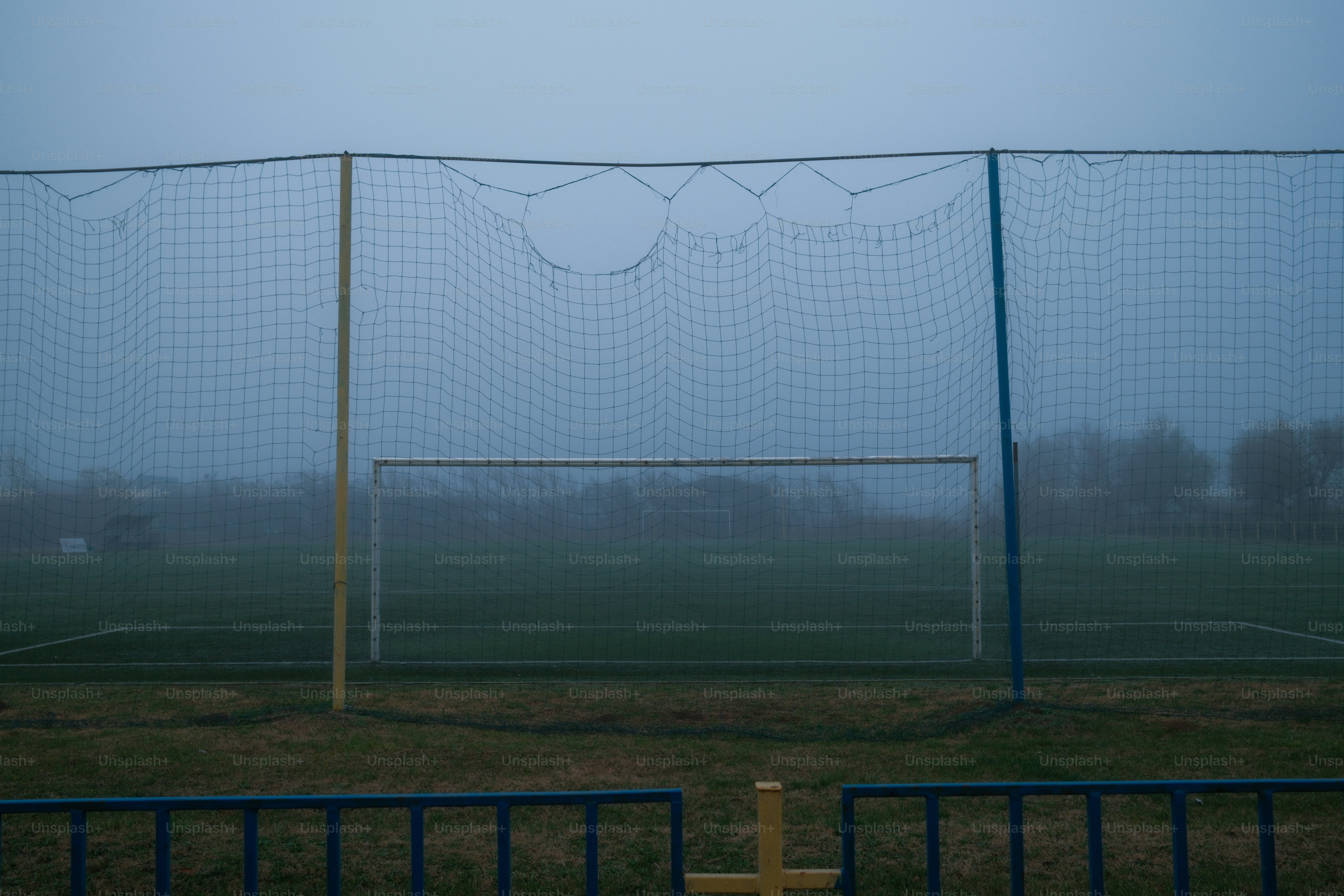 Soccer field goal in the fog