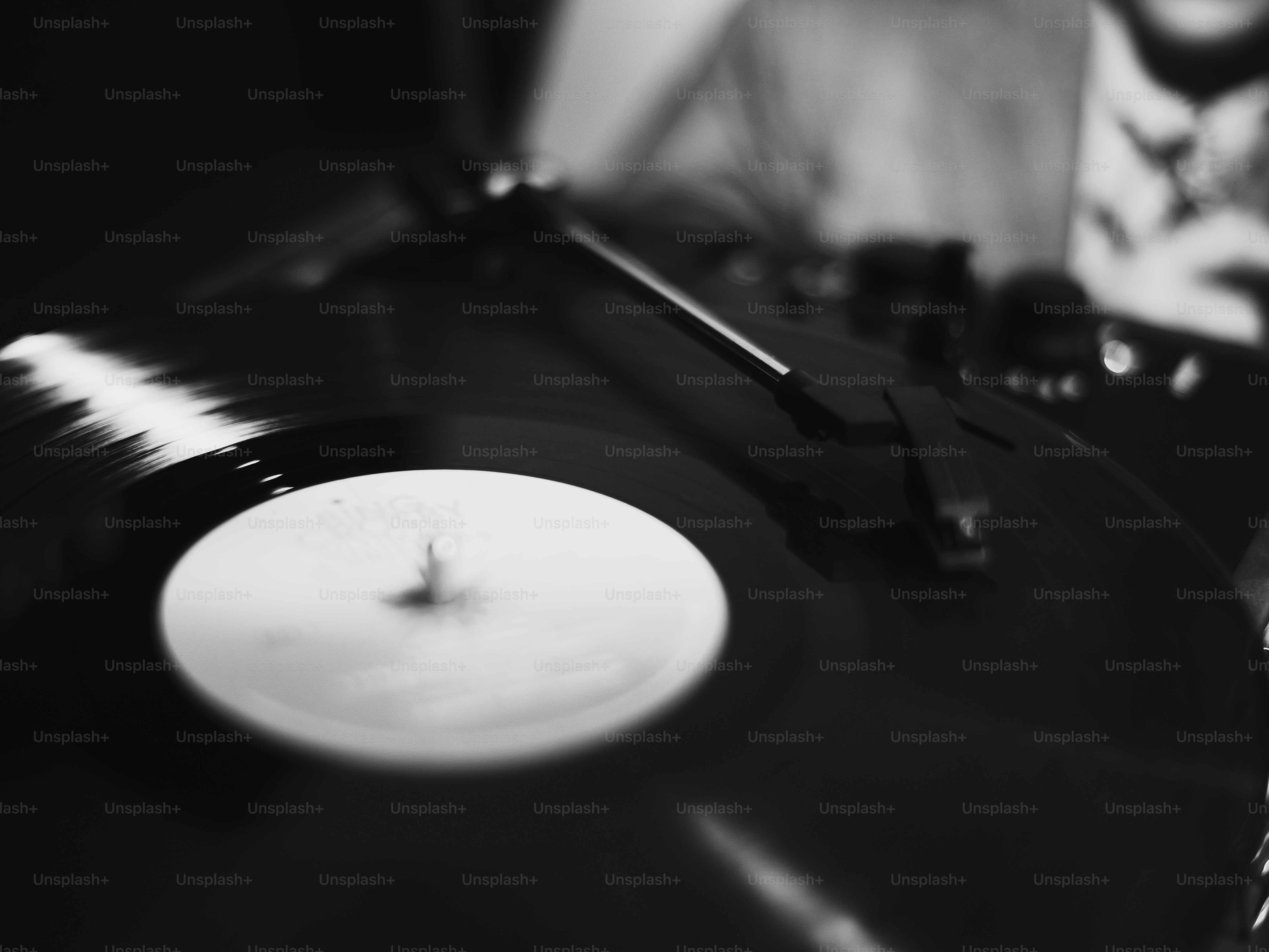 Close-up of a spinning vinyl record on a turntable.