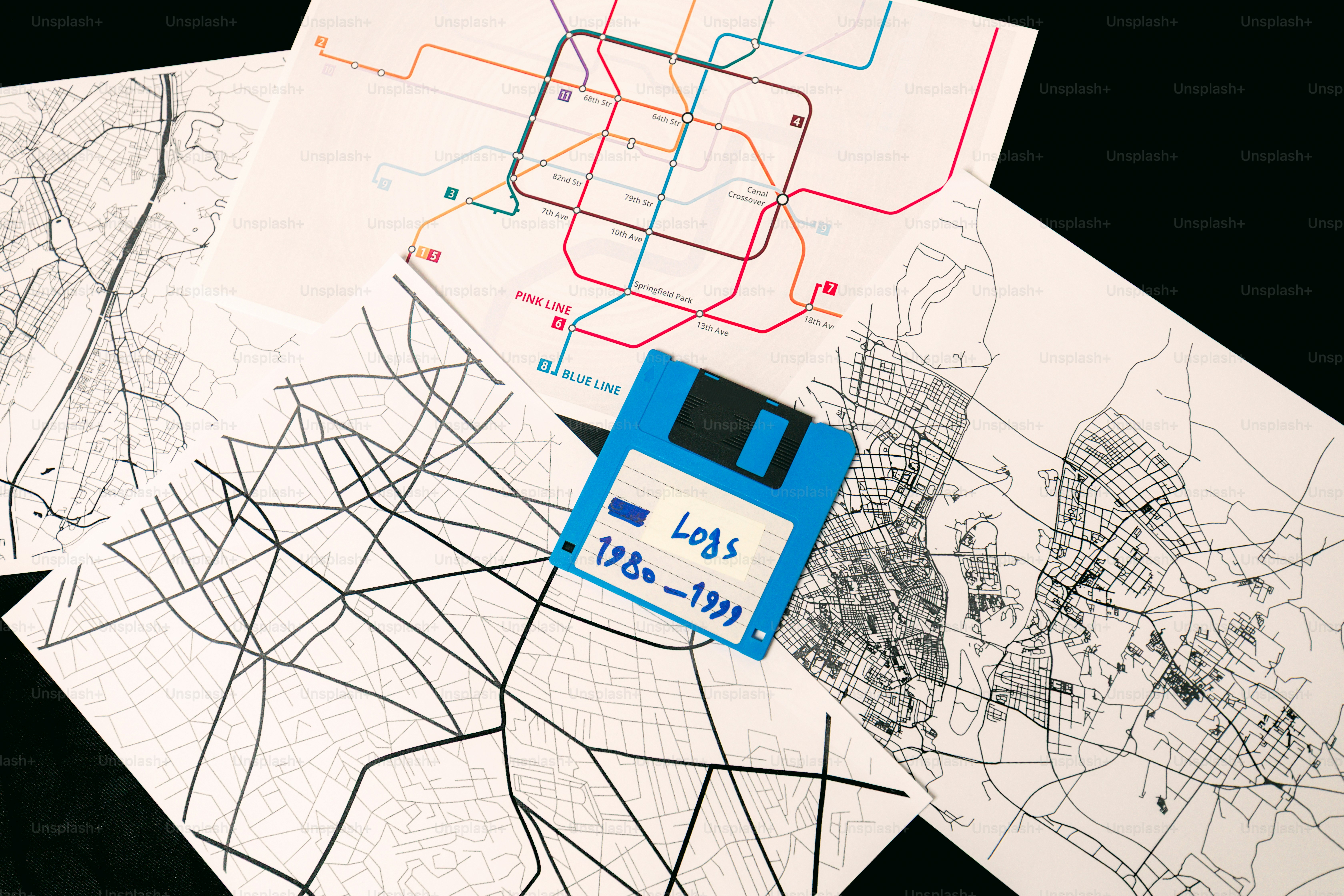 Floppy disk on top of city maps