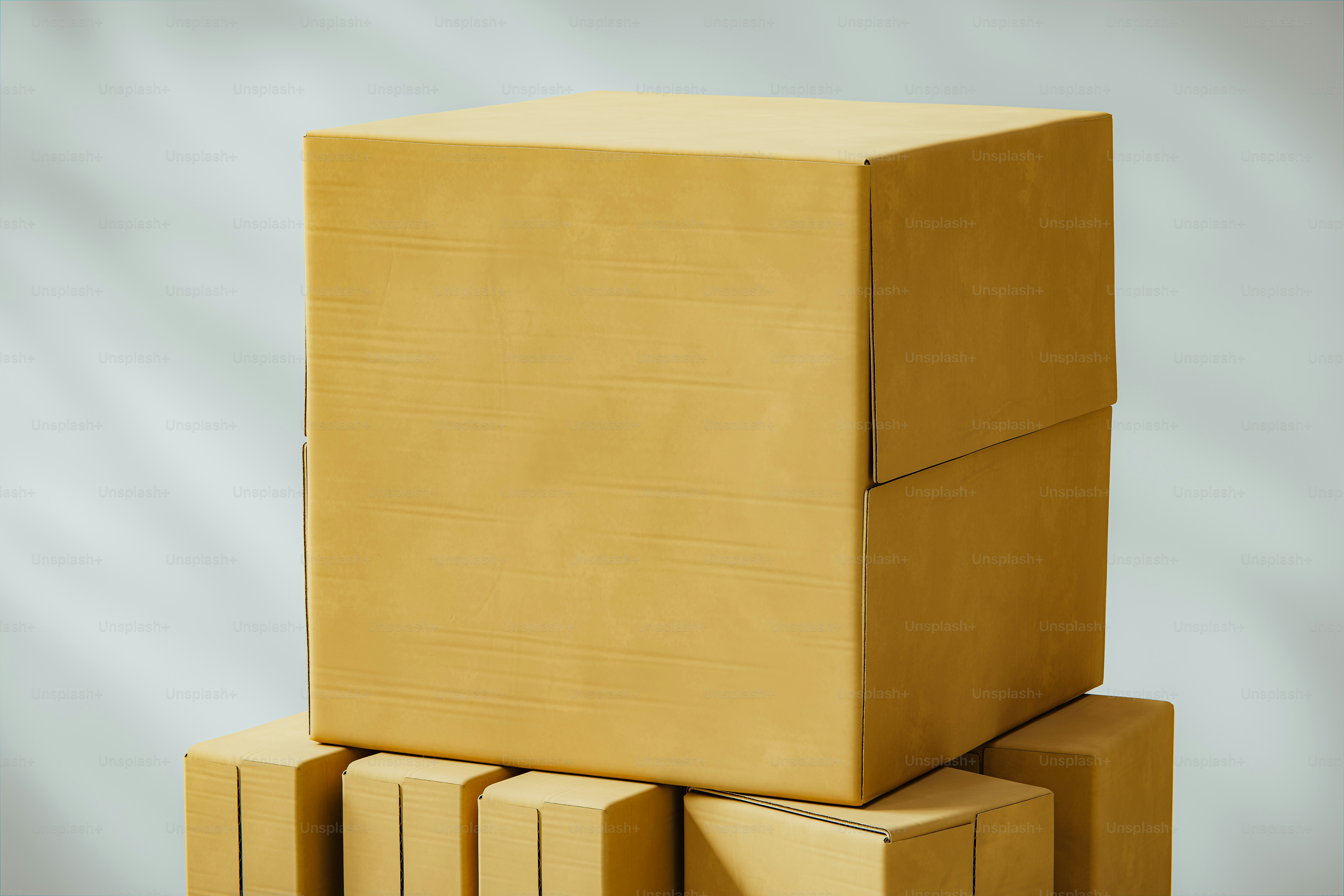 Several cardboard boxes stacked on top of each other.