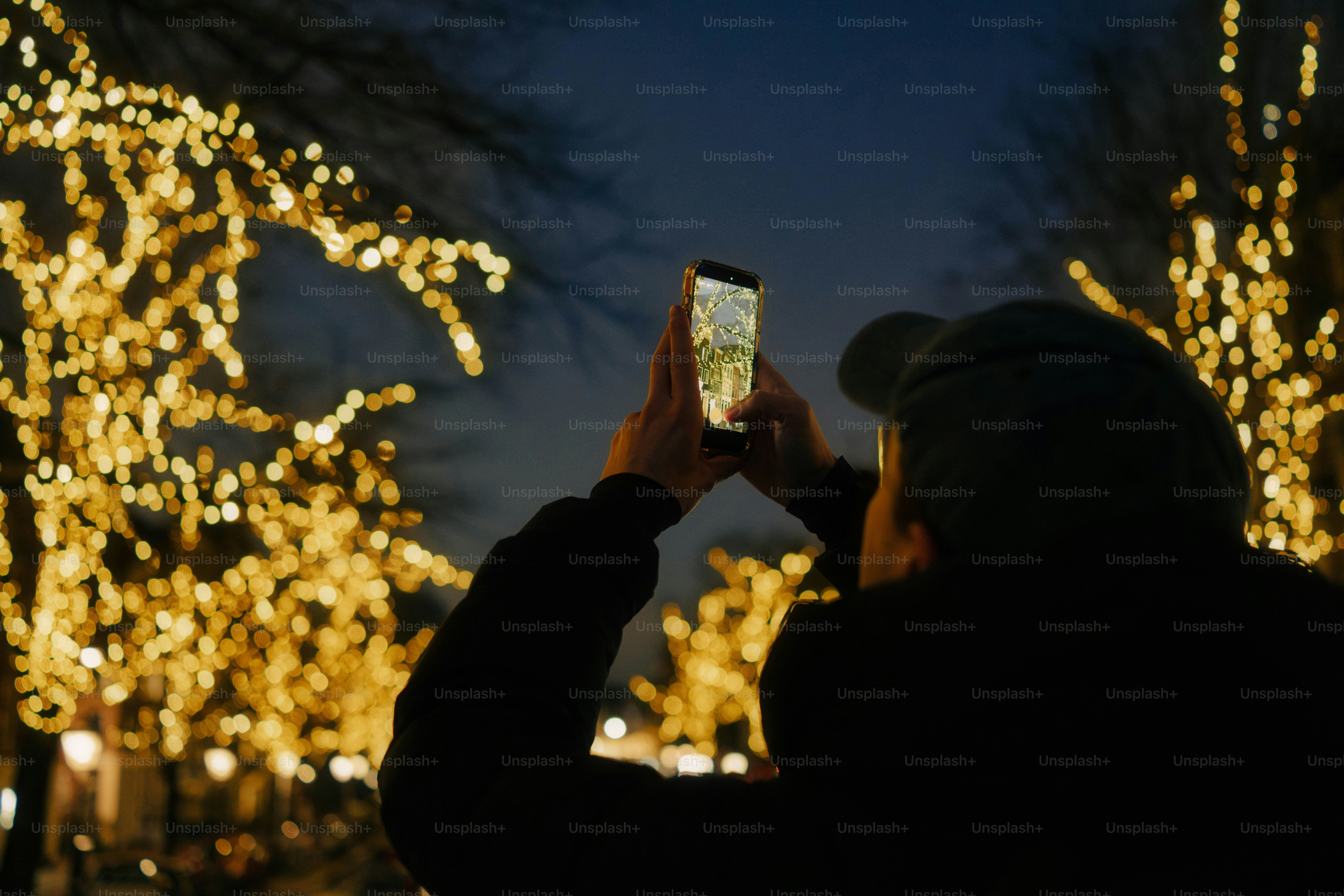 Christmas tree glowing in a window at night photo – Christmas Image on ...
