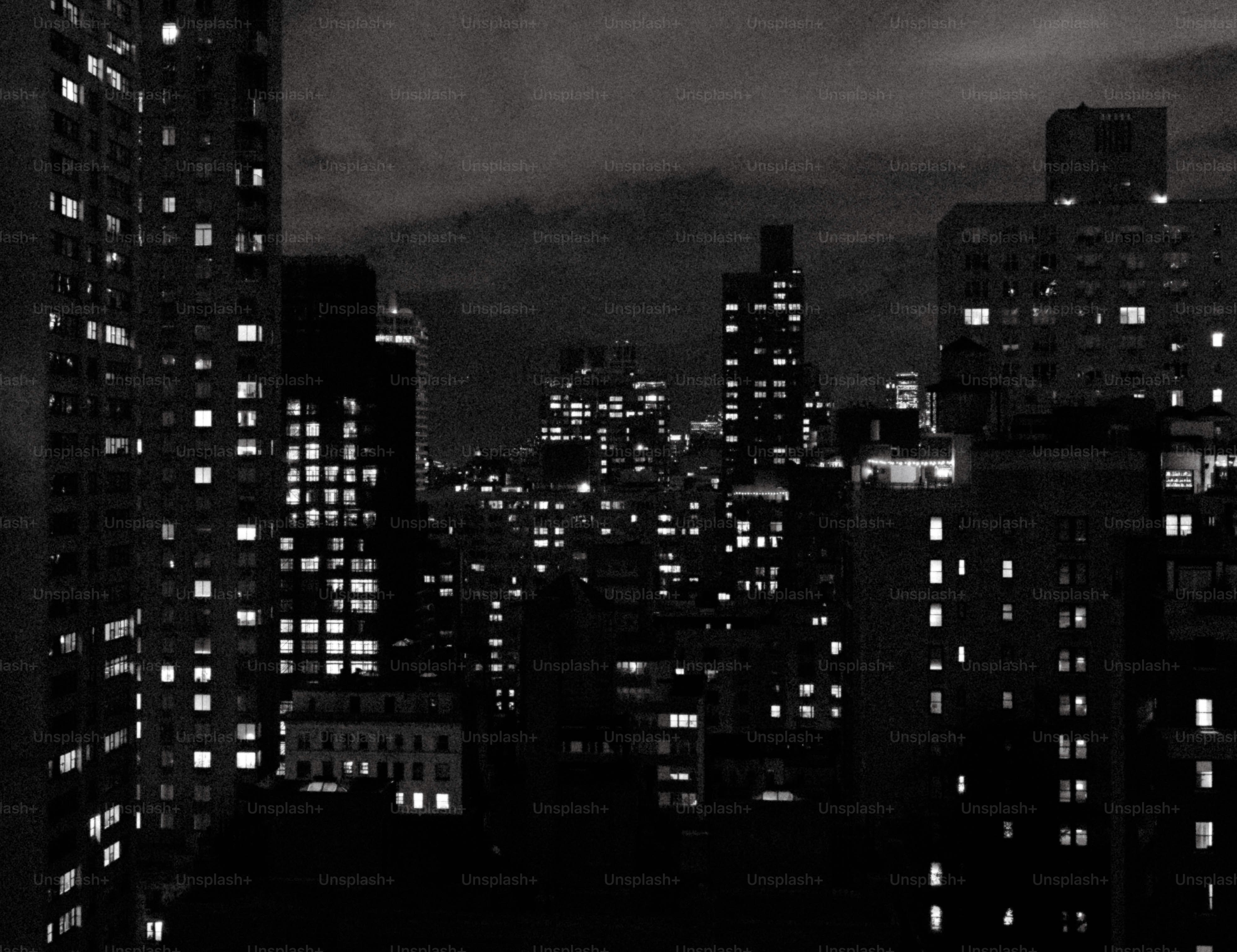 City skyline with illuminated buildings at night. photo – Dark Image on ...