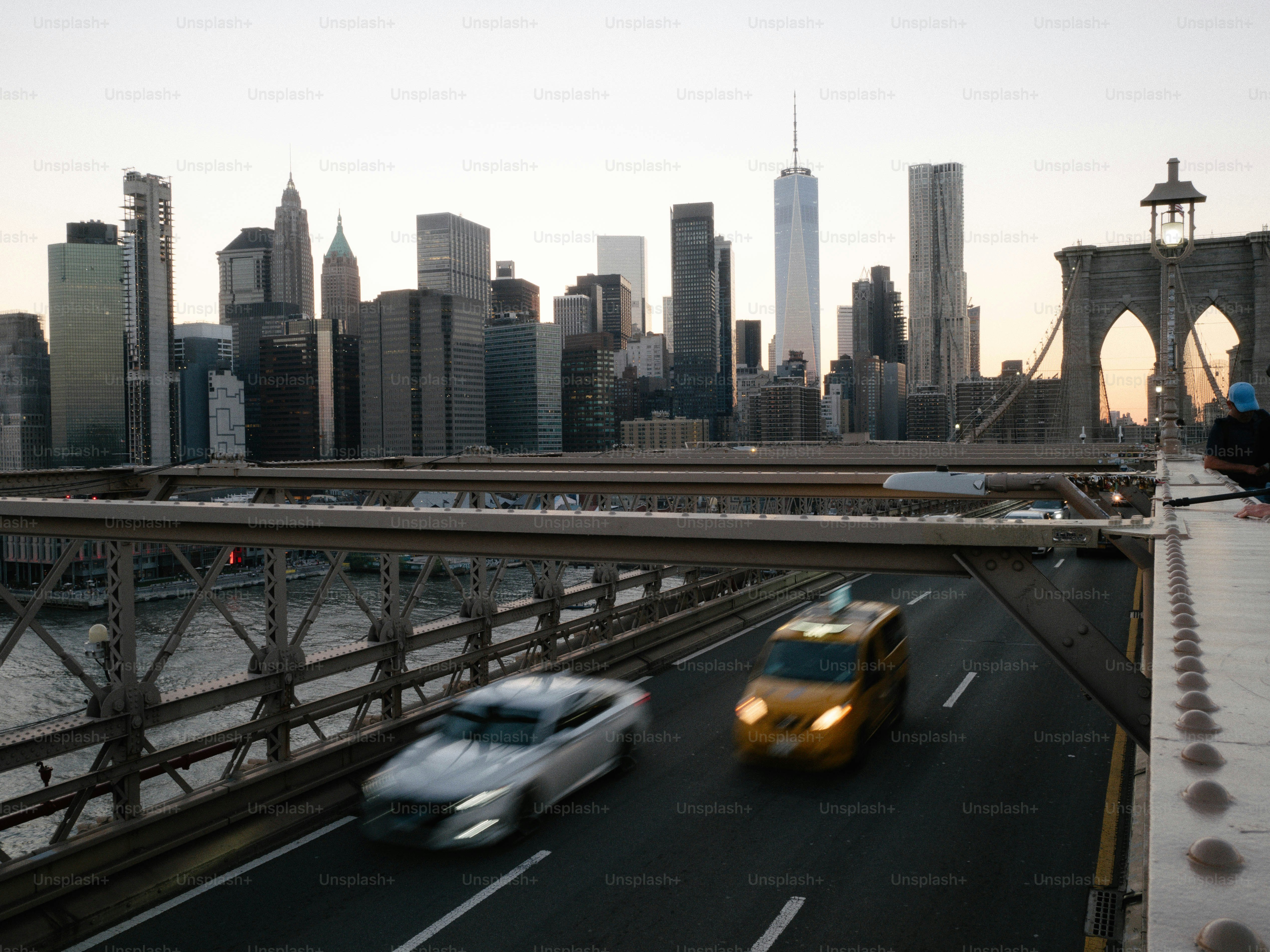 New york city skyline with brooklyn bridge and traffic.