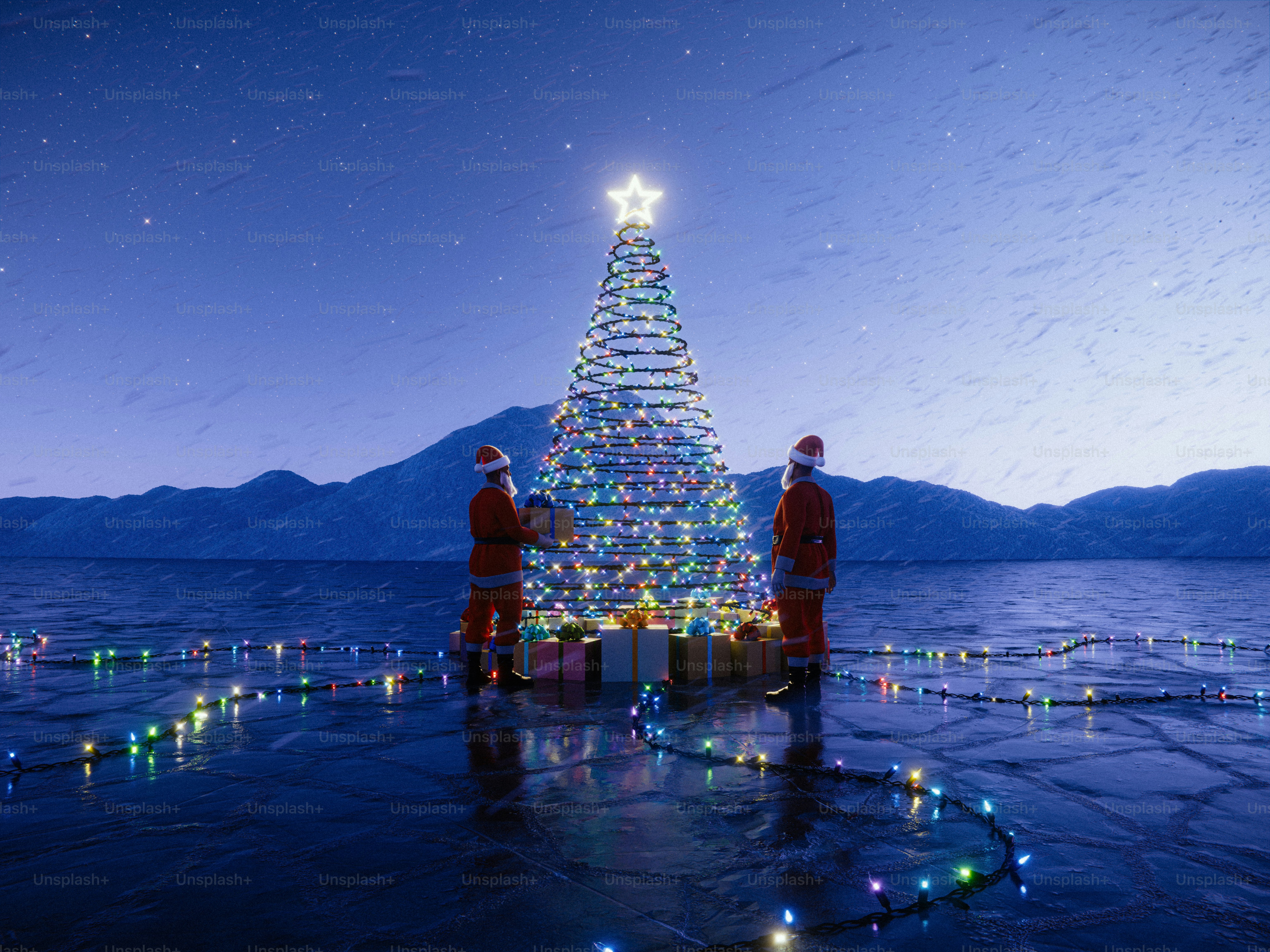 Two santas decorate a christmas tree by a lake.