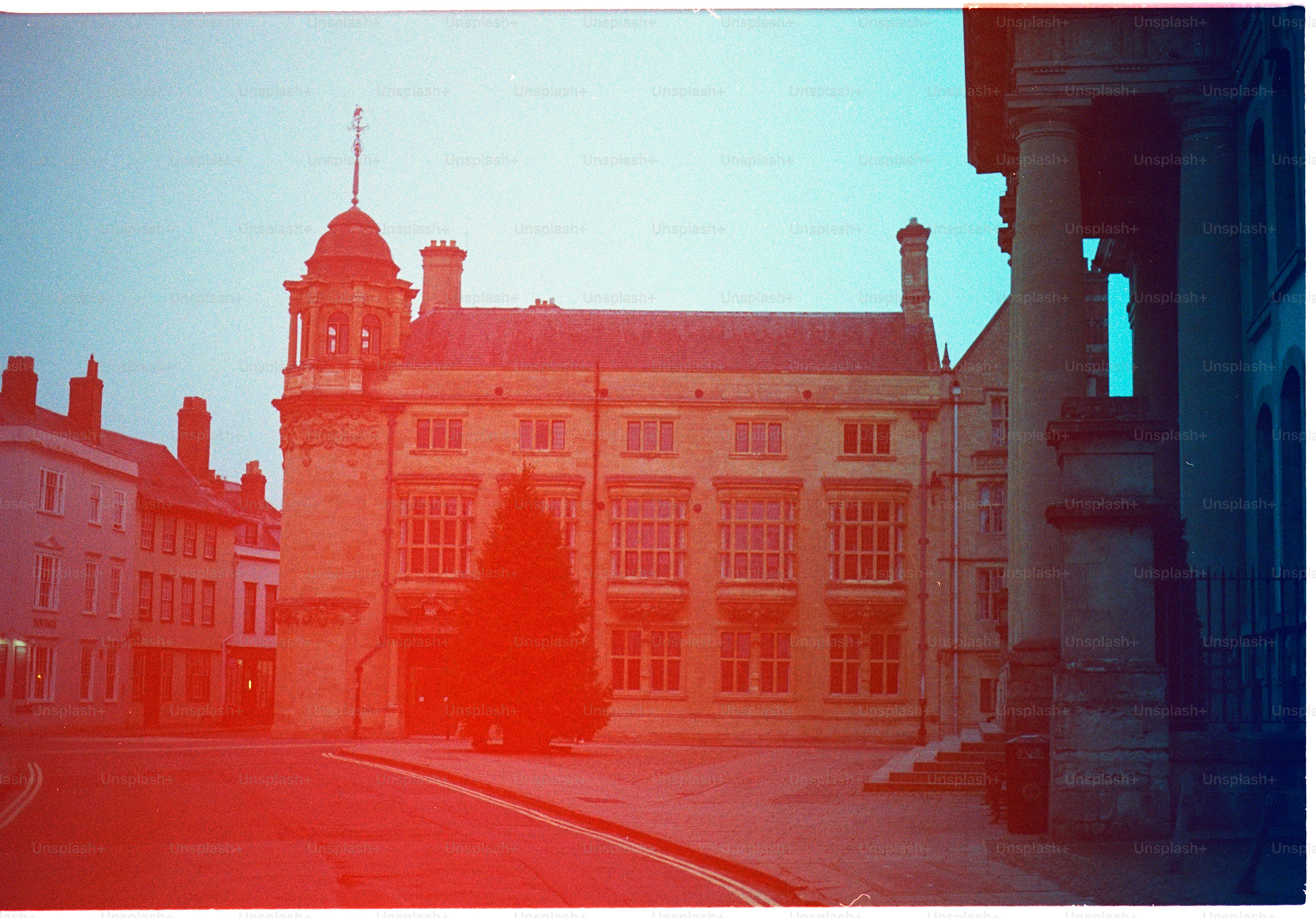 Historic building with ornate windows and a tower