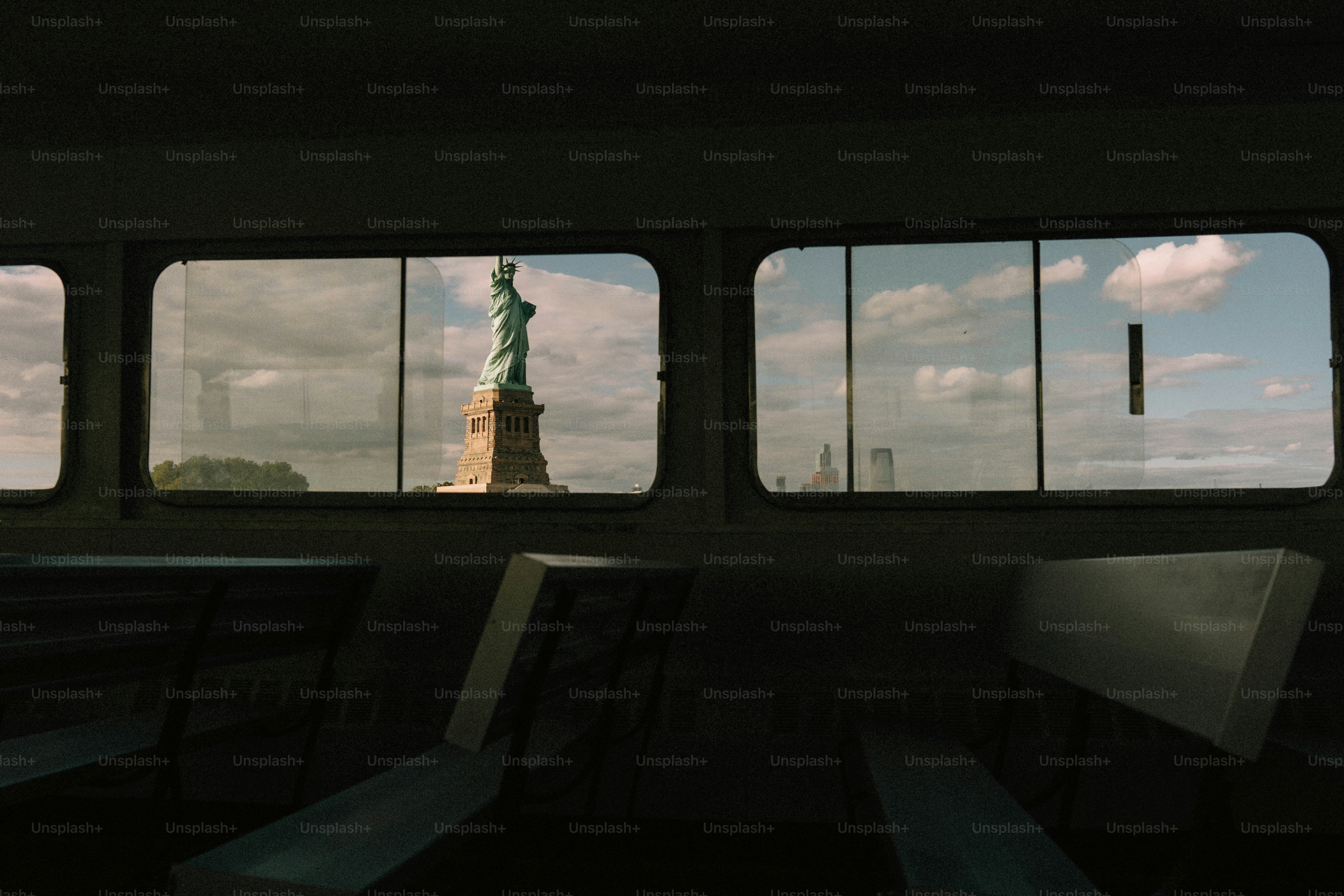 Statue of liberty seen through ferry windows