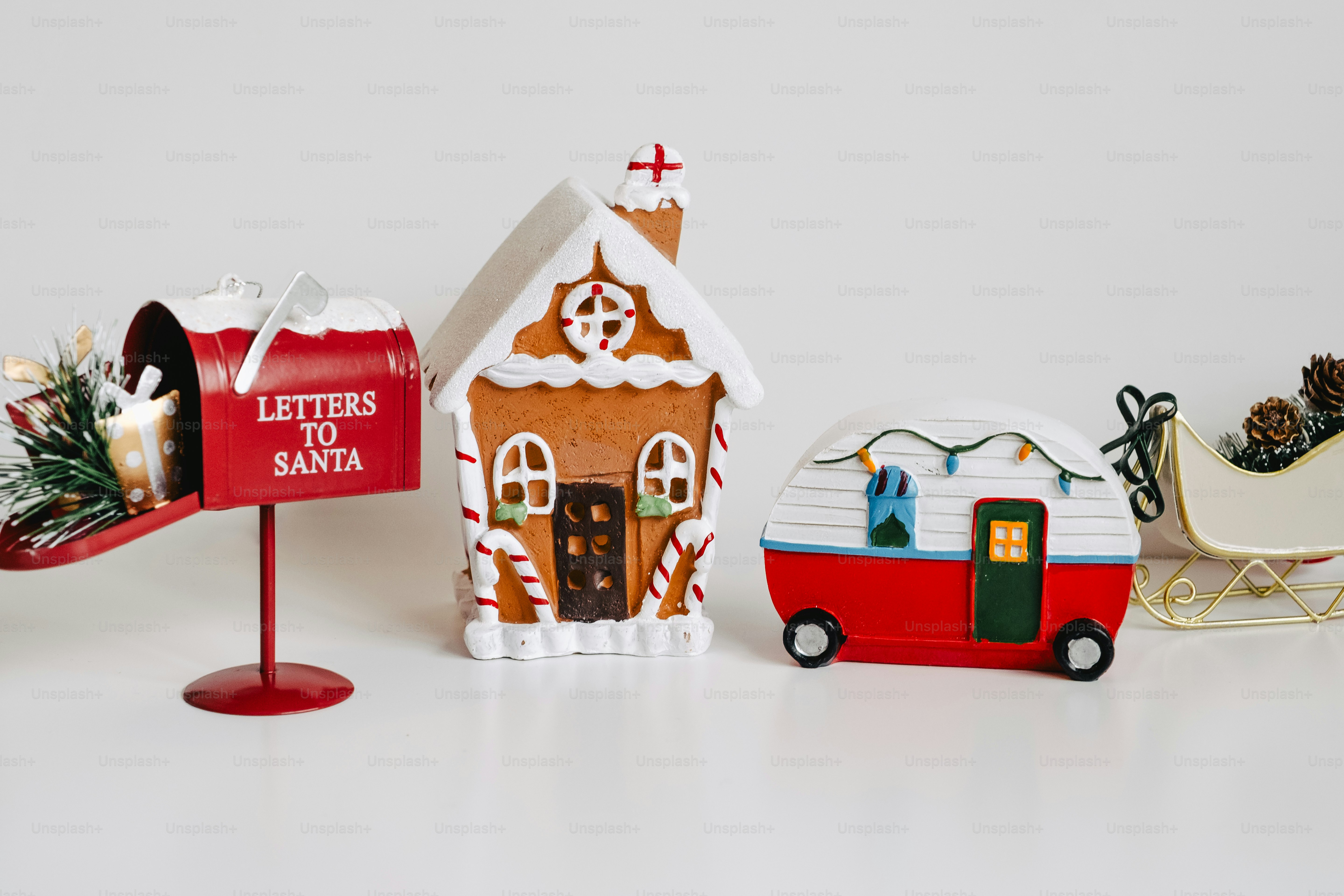 Christmas gingerbread house, camper, and mailbox decorations