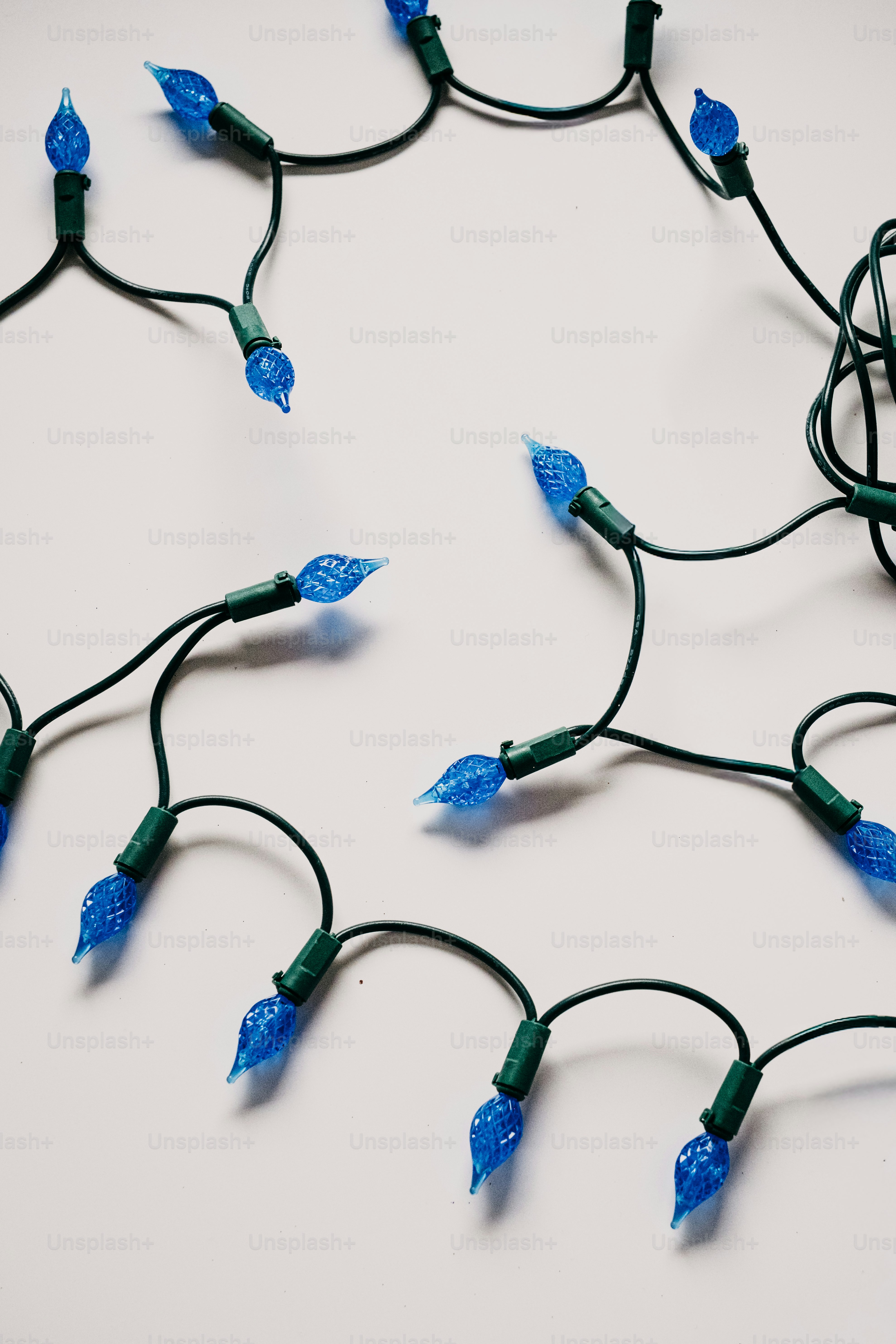 String of blue flame-shaped christmas lights.