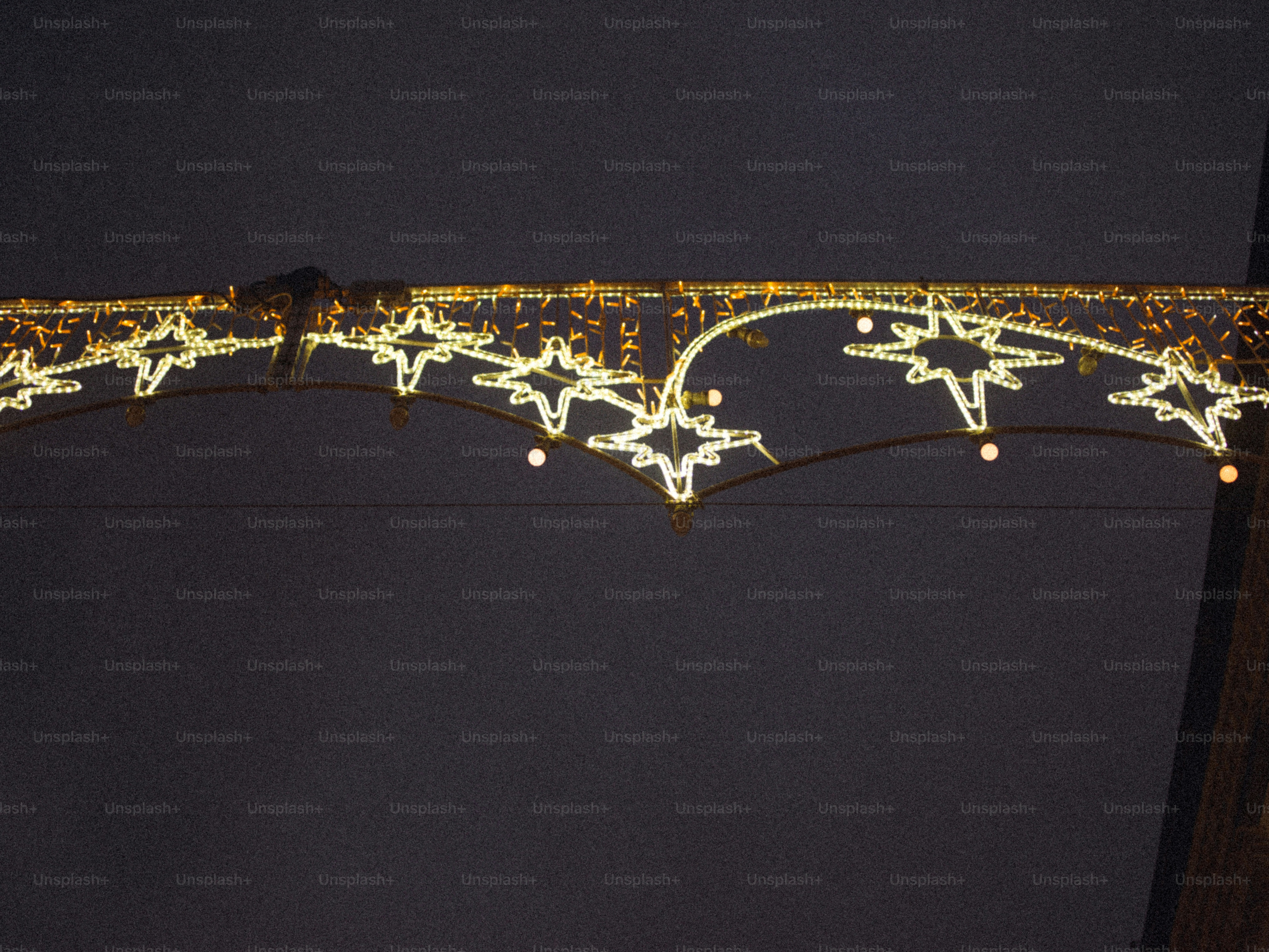 Decorative star lights illuminate the night sky