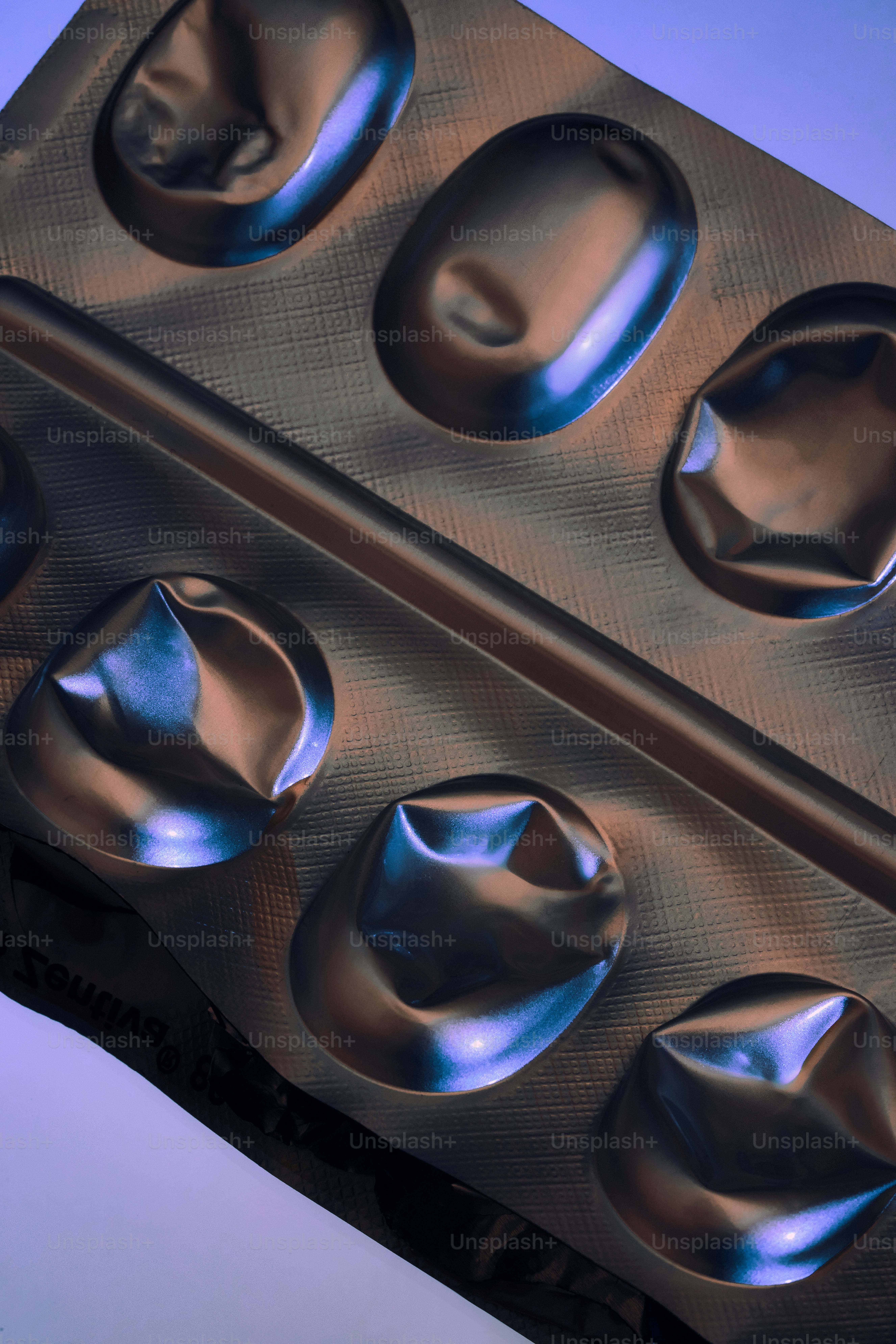 Empty foil blister pack with crushed pills