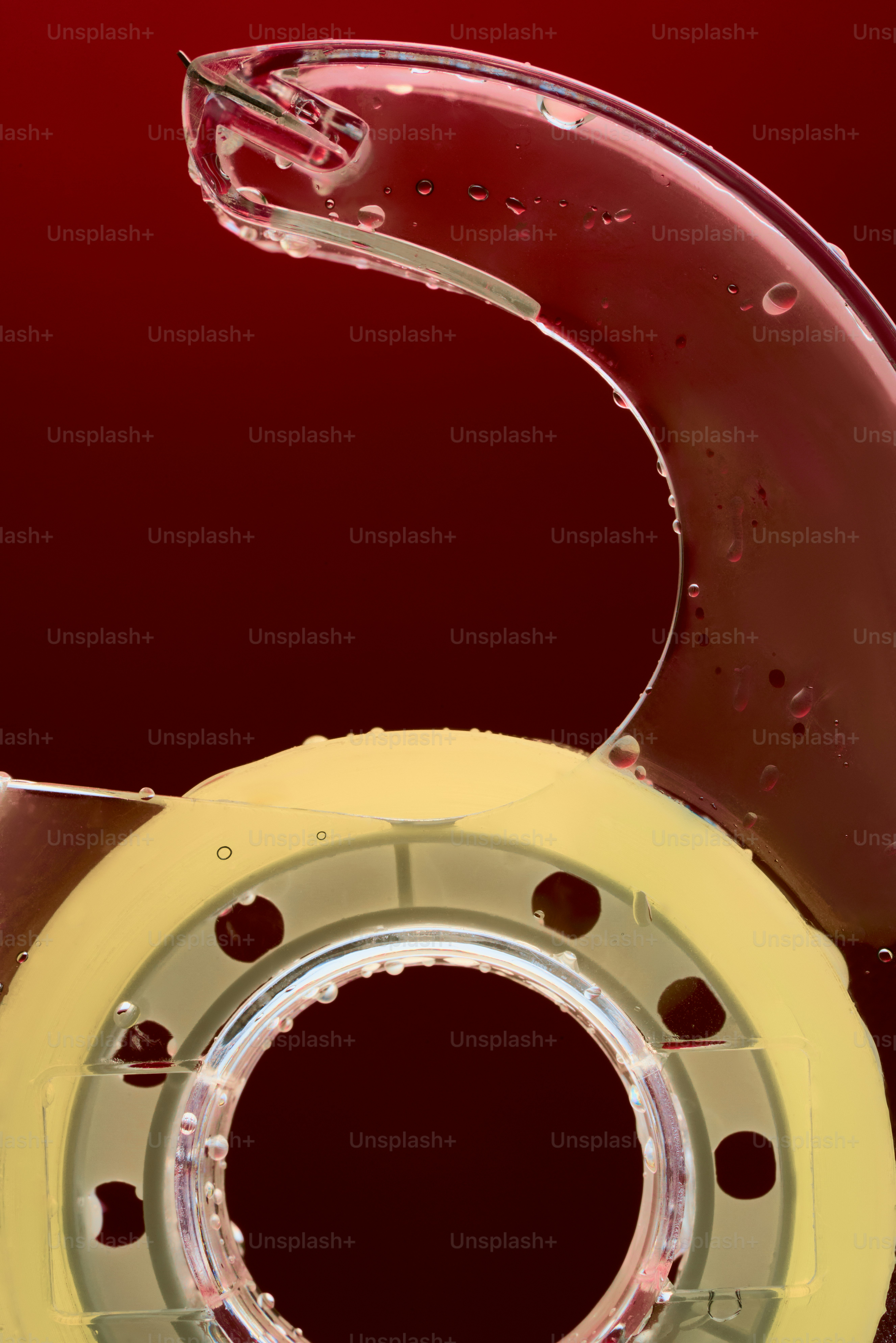 Close-up of a roll of tape with water droplets.